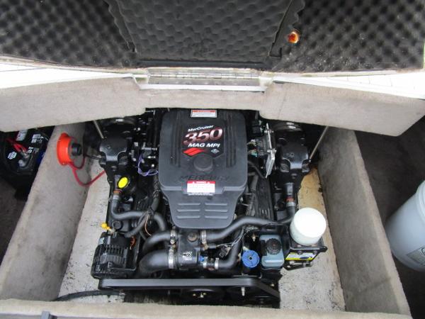 2004 Ebbtide 22 Mystique boat engine compartment with MerCruiser 350 Mag MPI engine.