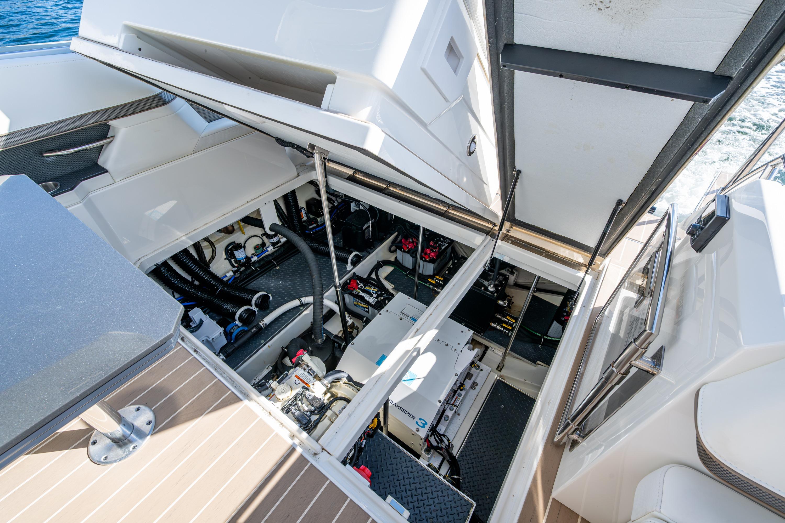 2022 Formula 380 Super Sport Crossover OB engine compartment, showcasing advanced marine engineering.