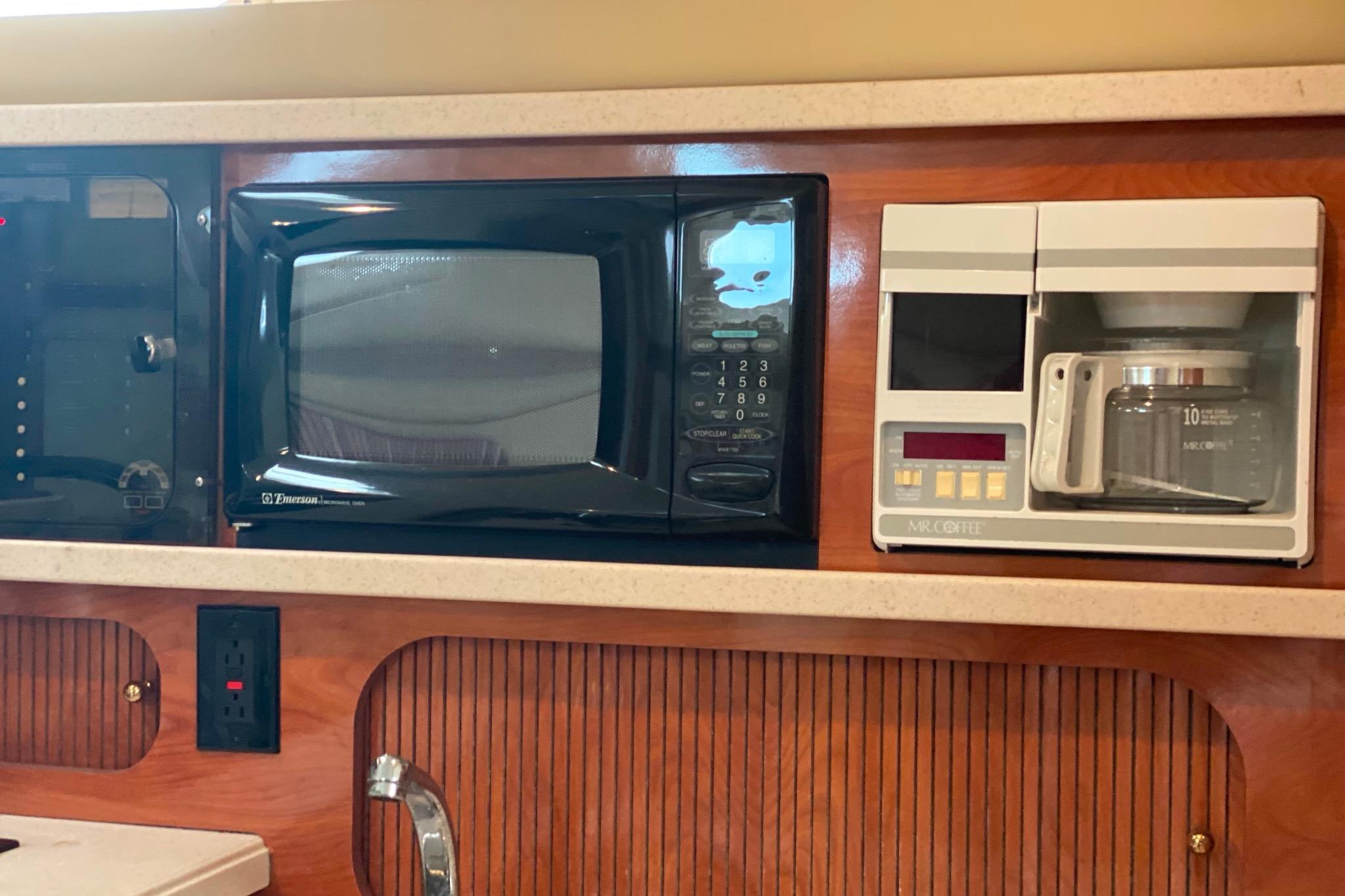 2003 Rinker Fiesta Vee 342 galley with microwave and coffee maker.