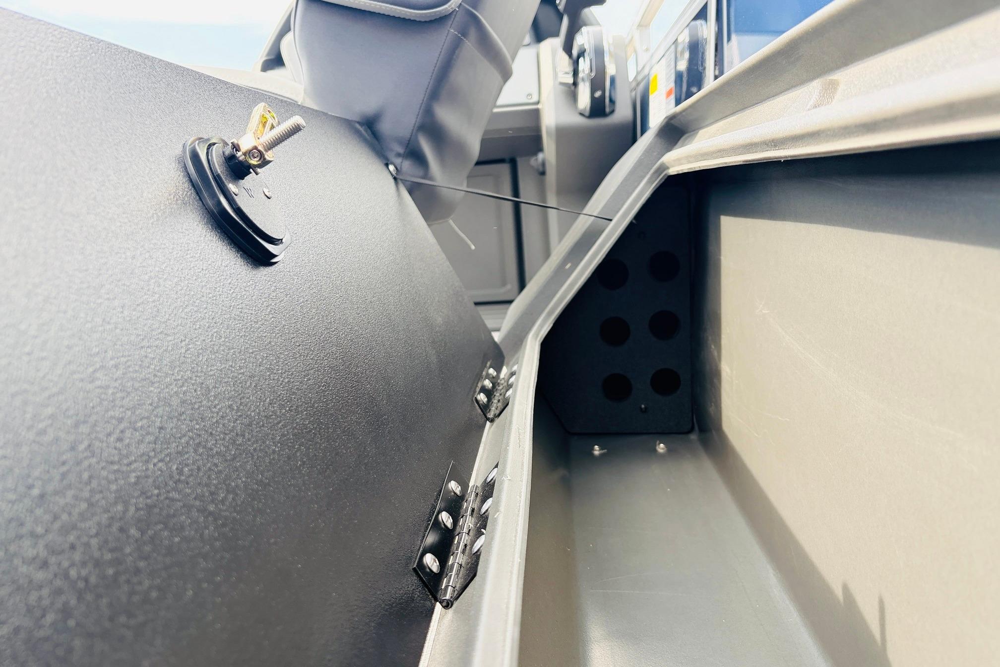Interior view of 2026 Sun Tracker SportFish 22 DLX boat dashboard and controls.