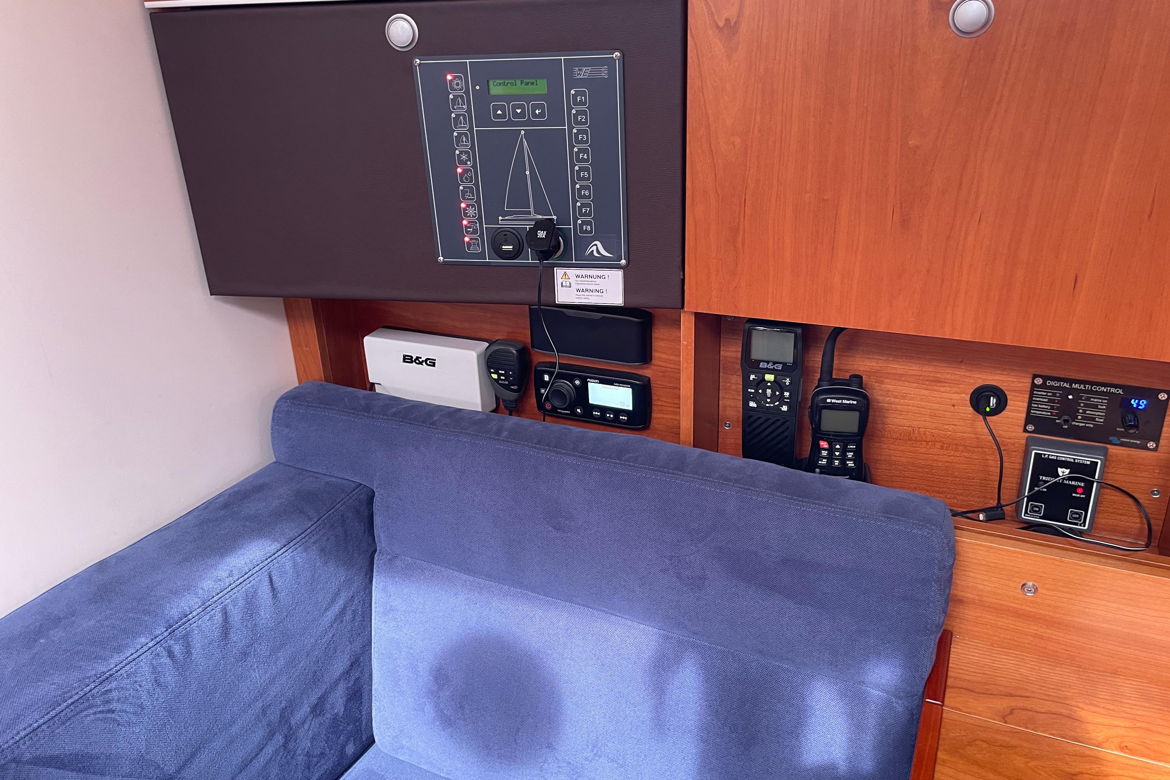 Interior of 2014 Hanse 415 yacht with control panel and communication devices.