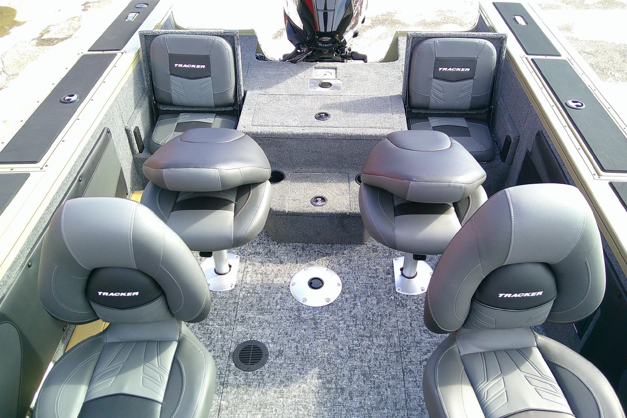 2026 Tracker Targa V-19 Combo boat interior with four cushioned seats and carpeted flooring.