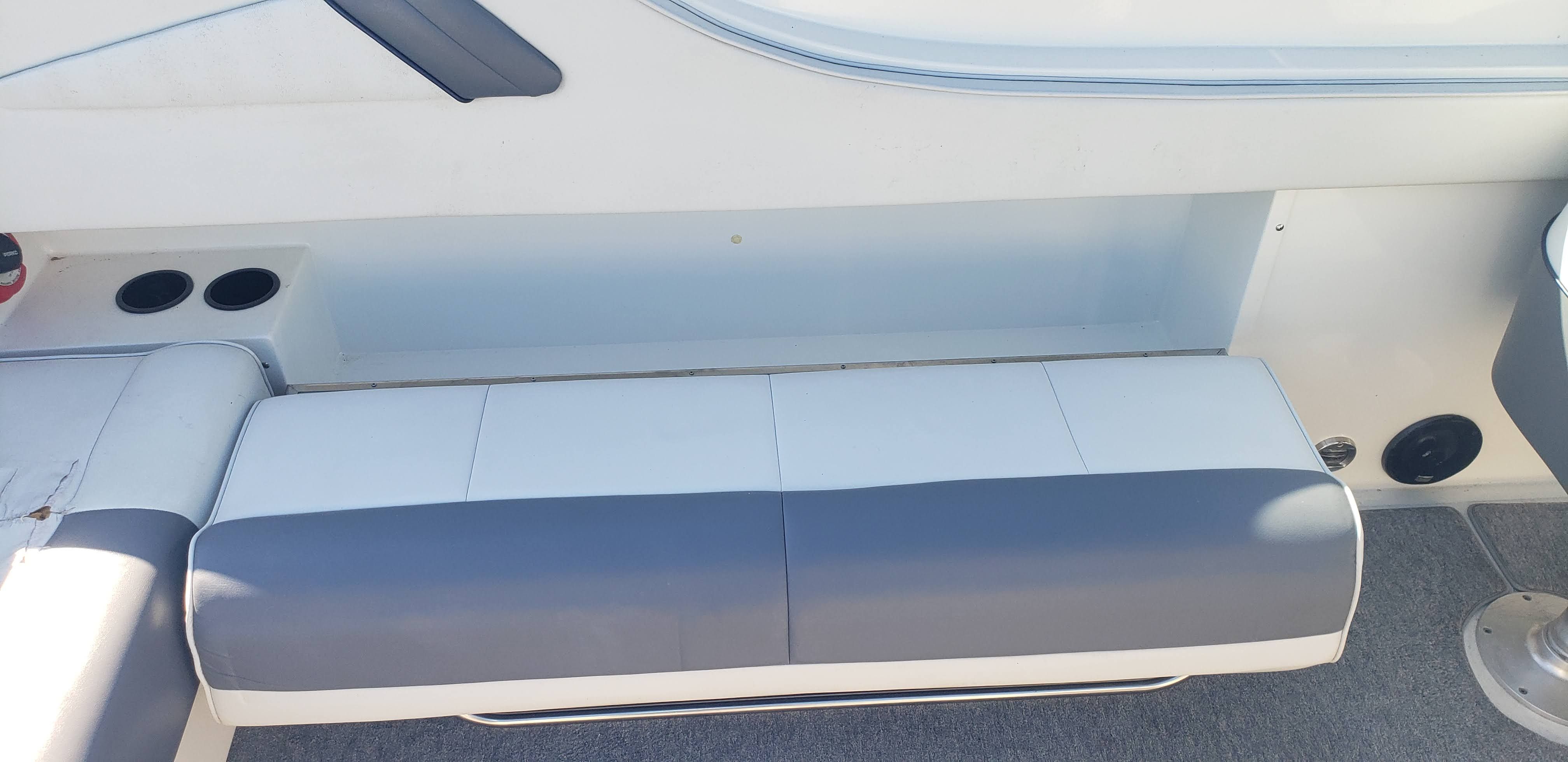 Interior of a 1993 Cobalt 272 boat with gray seating.