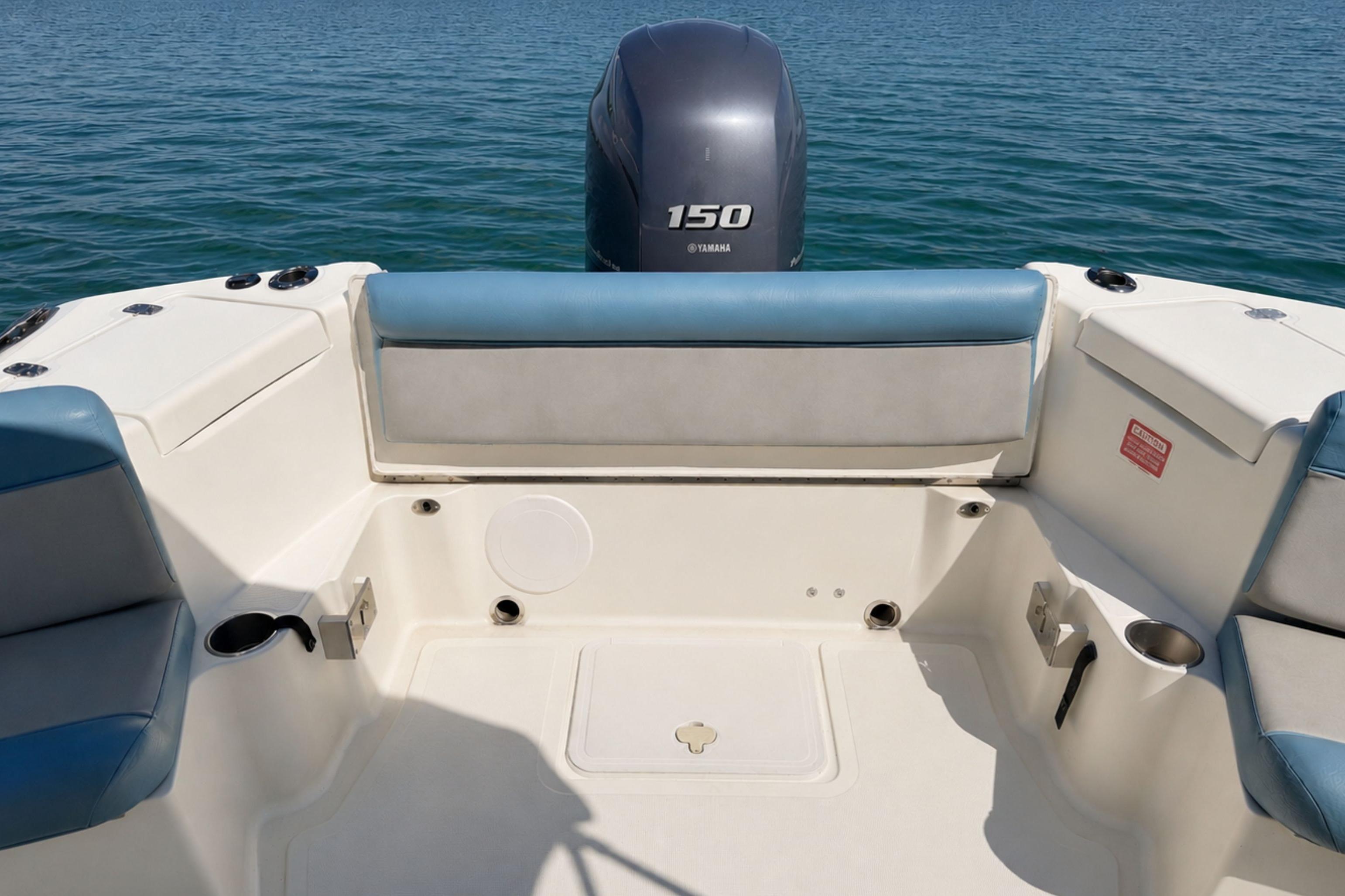 2008 Scout 222 Abaco boat interior with Yamaha 150 engine on calm water.
