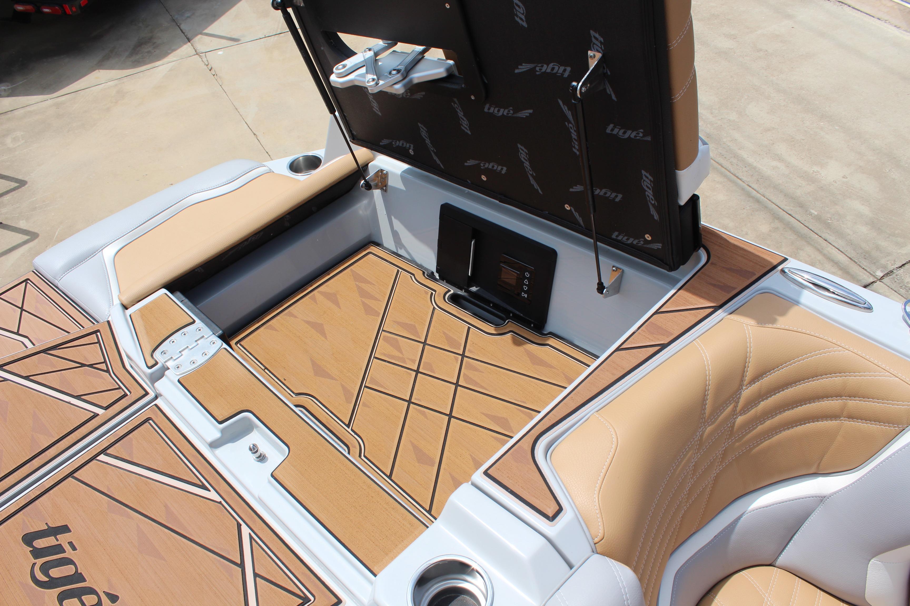 2024 Tigé Ultré 25ZX boat interior with tan seating and stylish deck design.