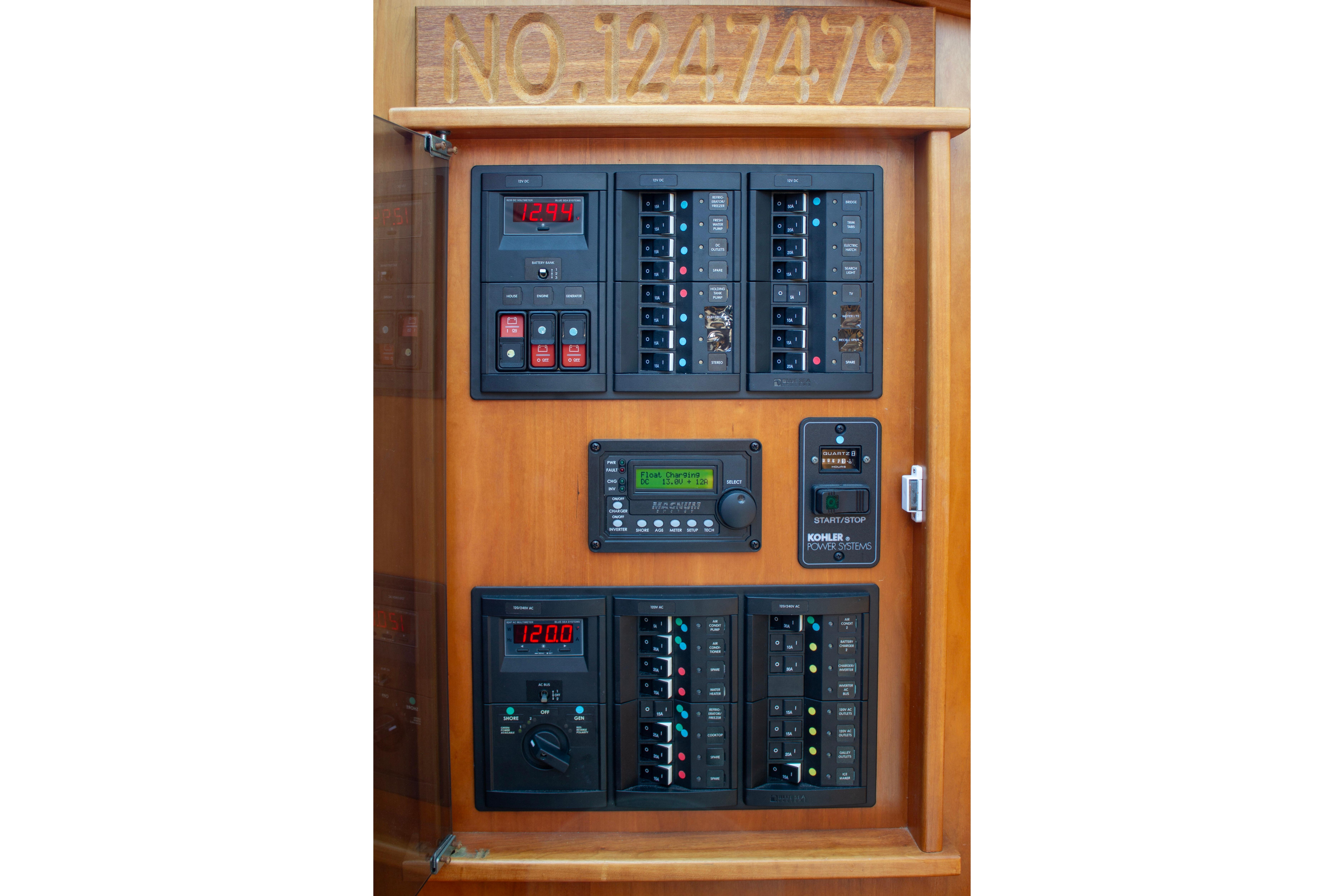 Electrical panel of 2013 Sabre 38 Salon Express boat, featuring various controls and displays.