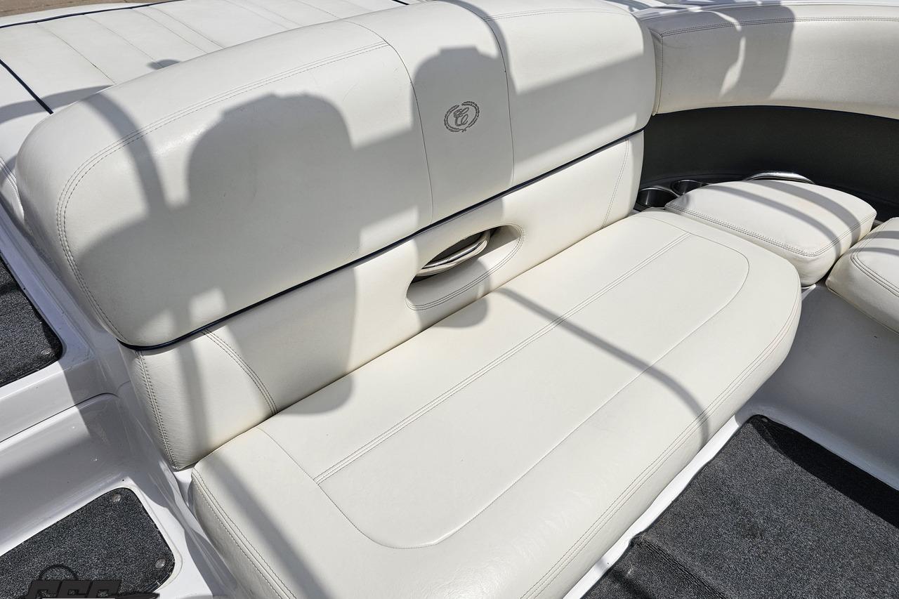 White leather seating on a 2010 Cobalt 232 WSS boat, showcasing luxury and comfort.