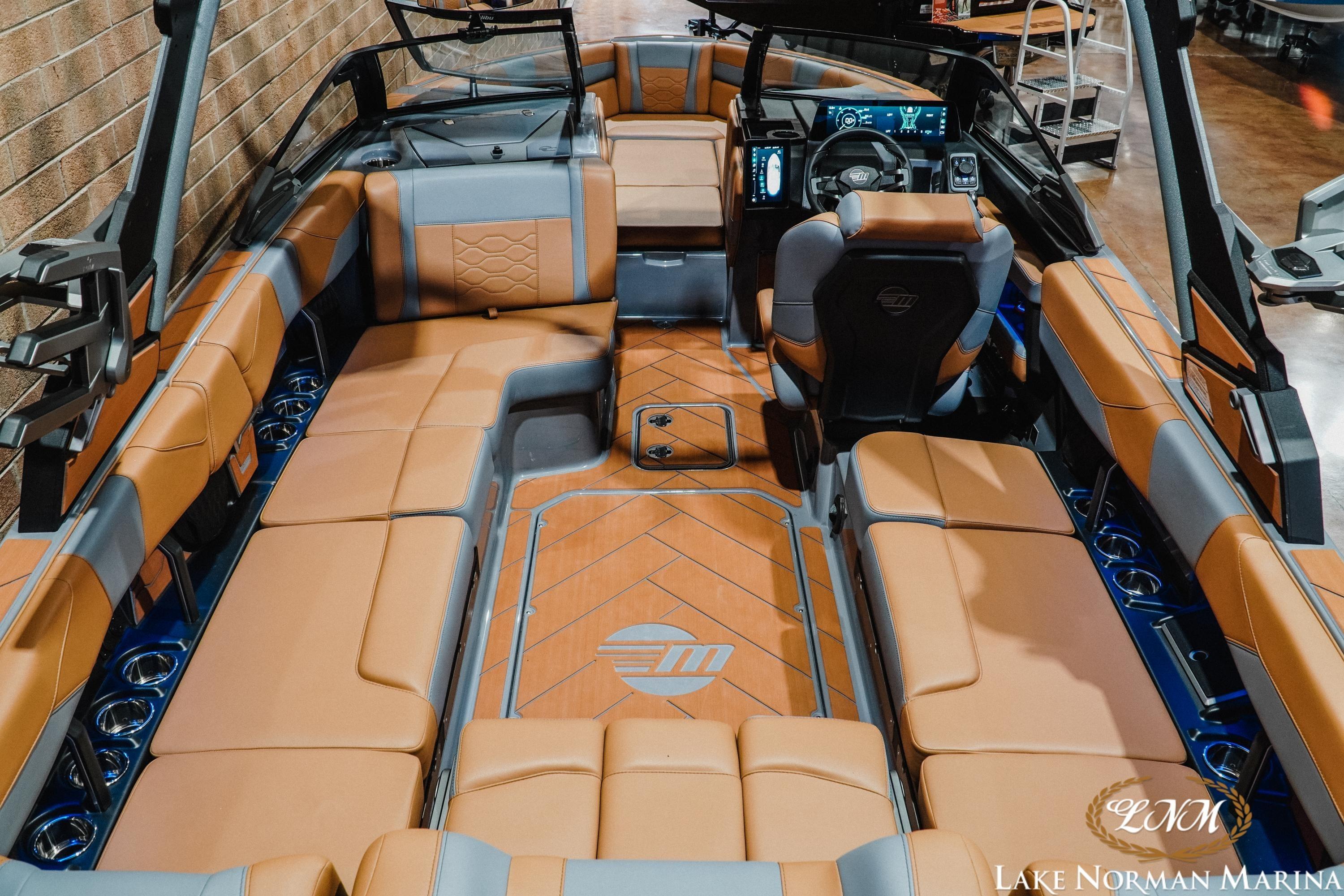 2026 Malibu Wakesetter 23 LSV interior with luxurious tan and gray seating.