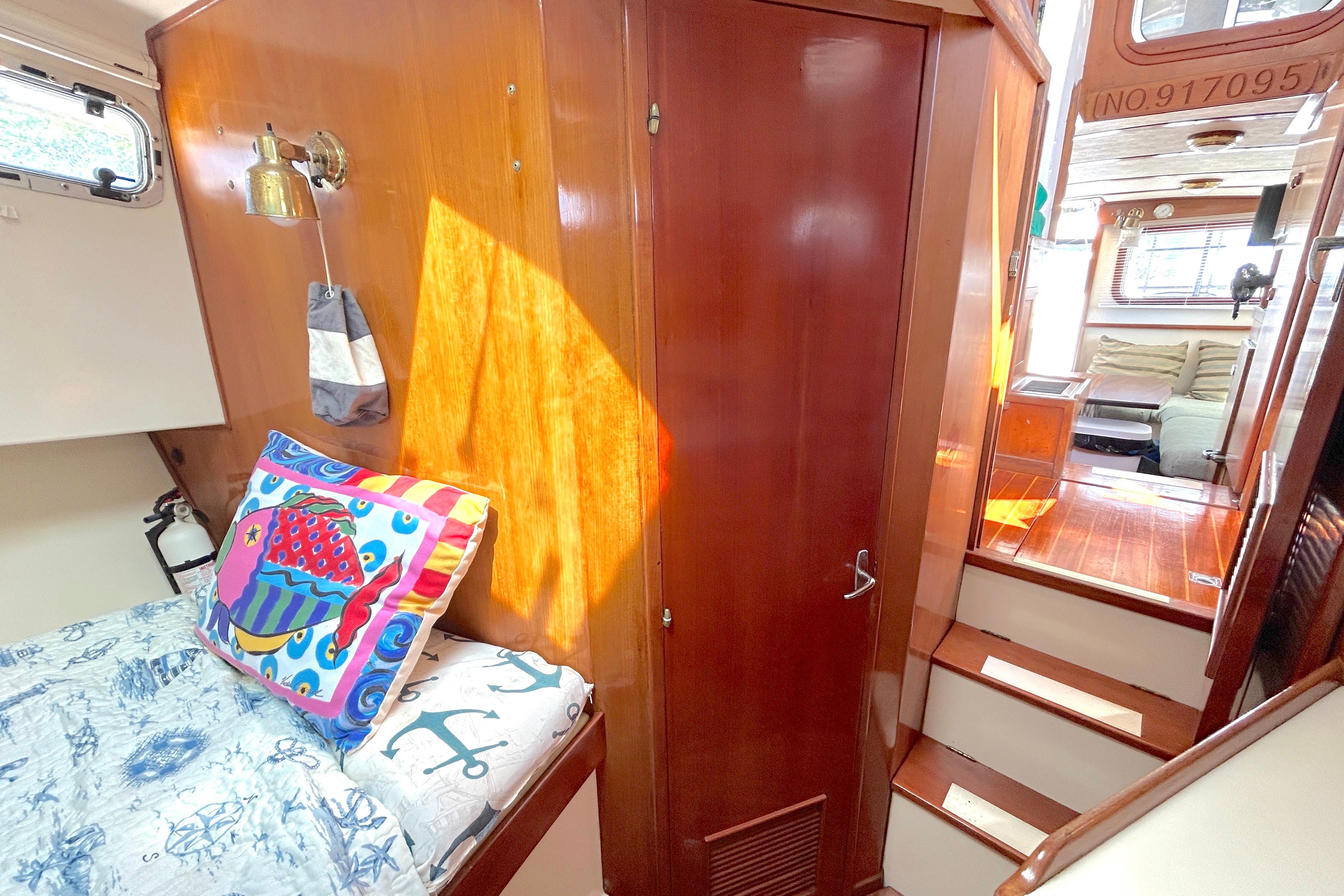 Interior of 1987 Transpacific Marine Eagle 32 Trawler with cozy cabin and vibrant decor.
