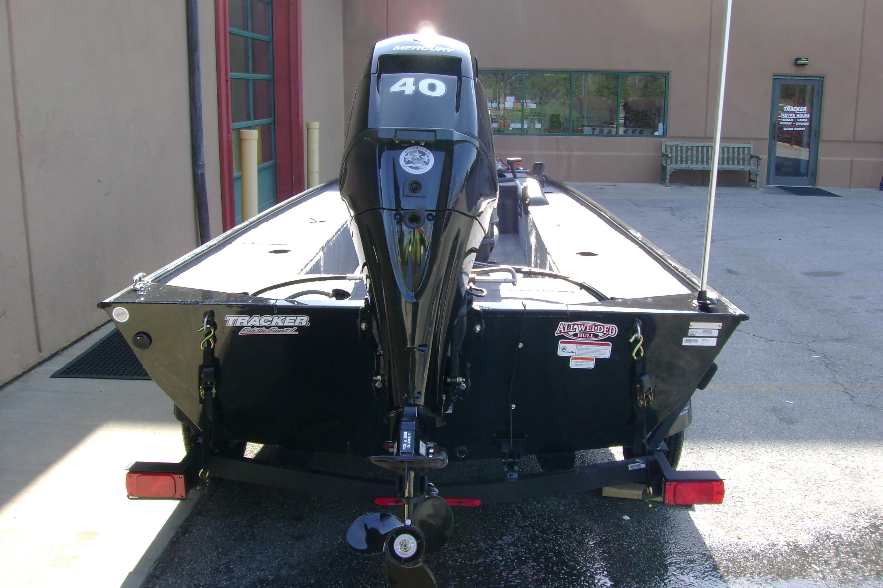 2026 Tracker Panfish 17 boat with a 40 HP Mercury engine, parked outdoors.