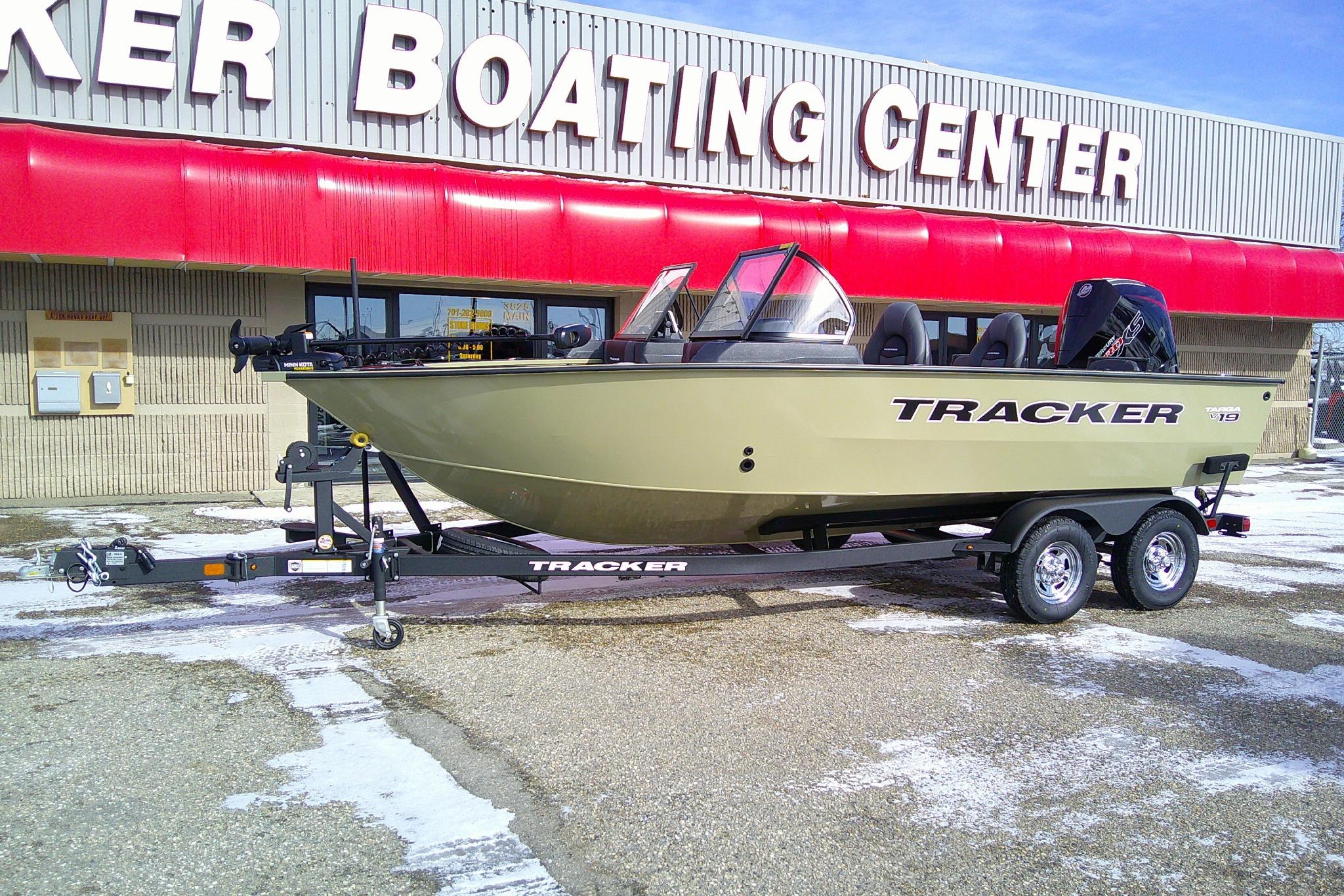 2026 Tracker Targa V-19 Combo boat on trailer at boating center.