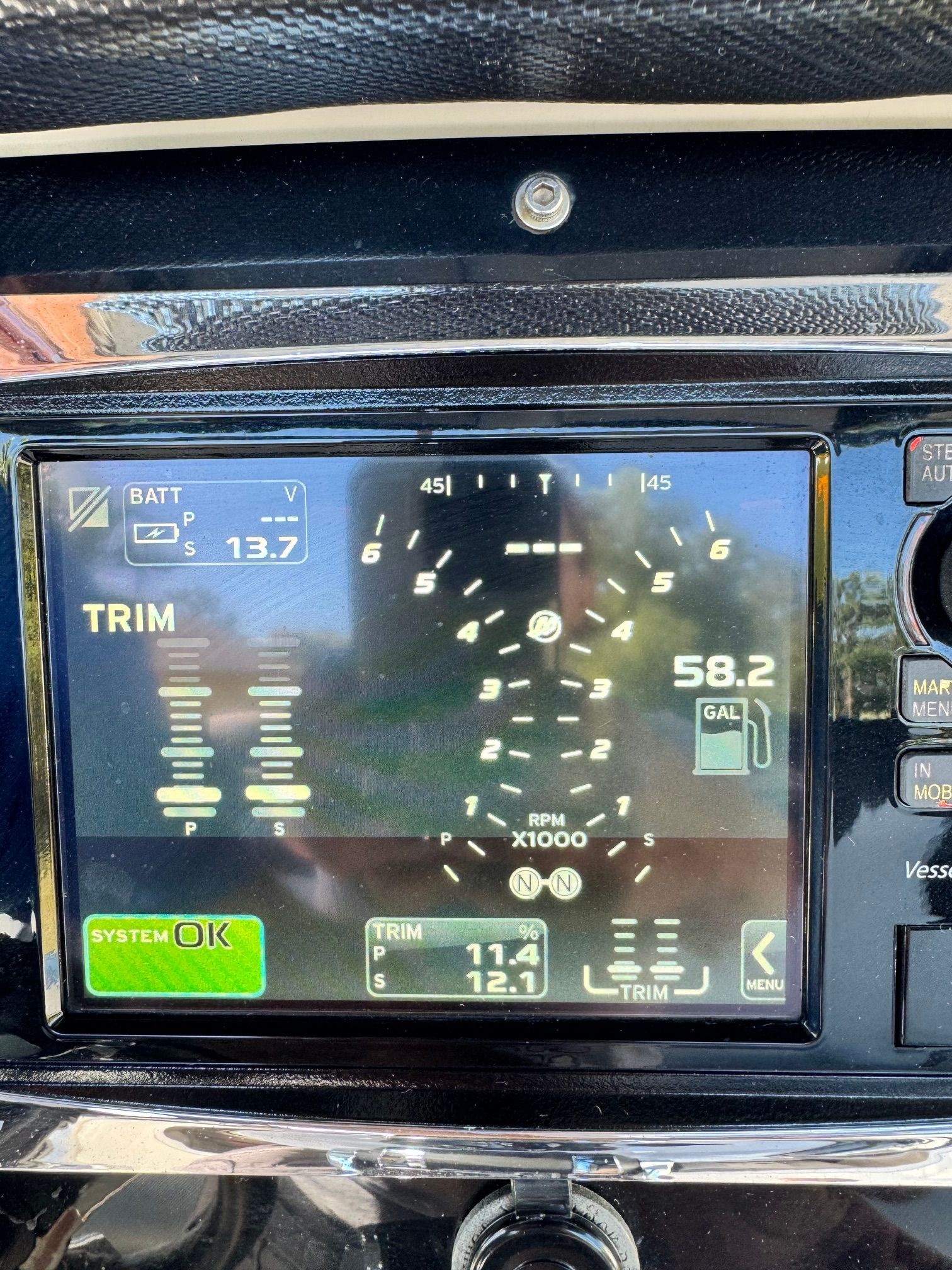 Dashboard of a 2017 Sunsation 32 CCX with trim and fuel gauge.