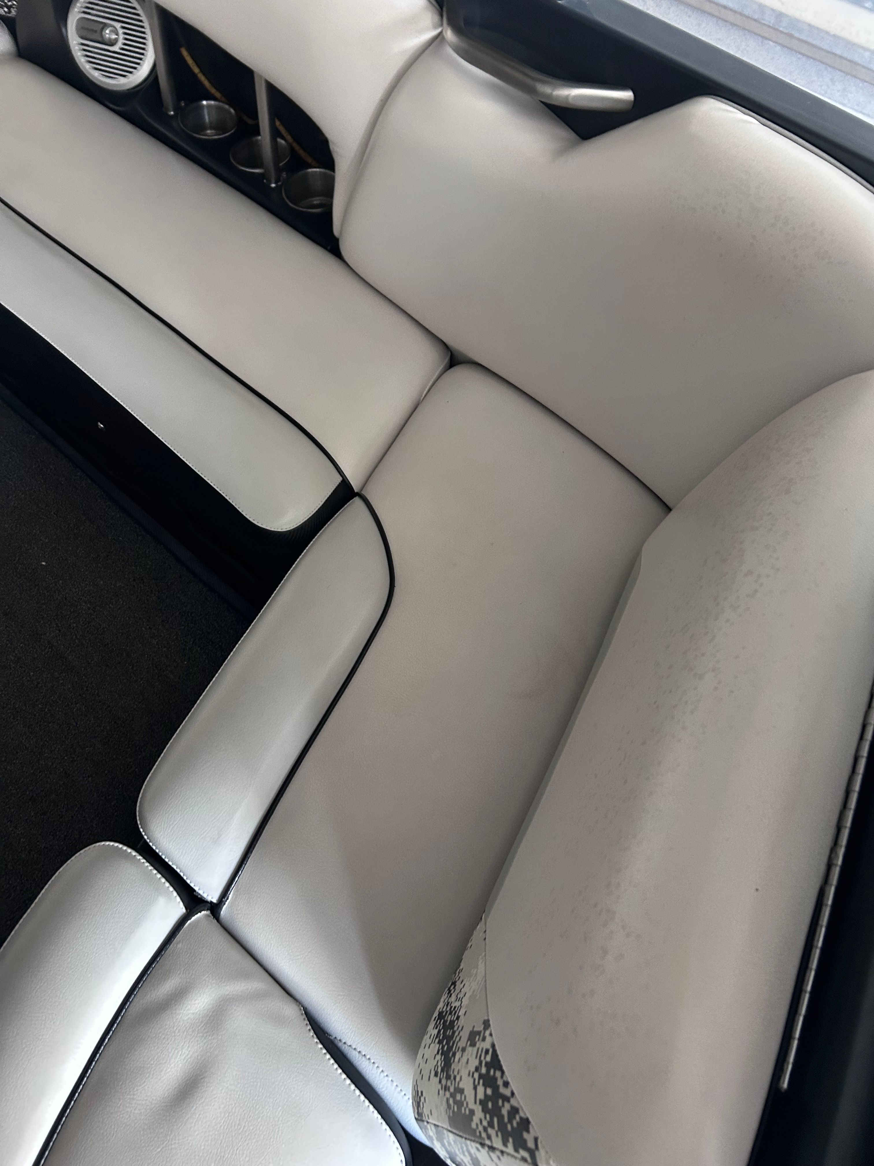 Interior of Axis A22 boat, white upholstery, 2013 model.