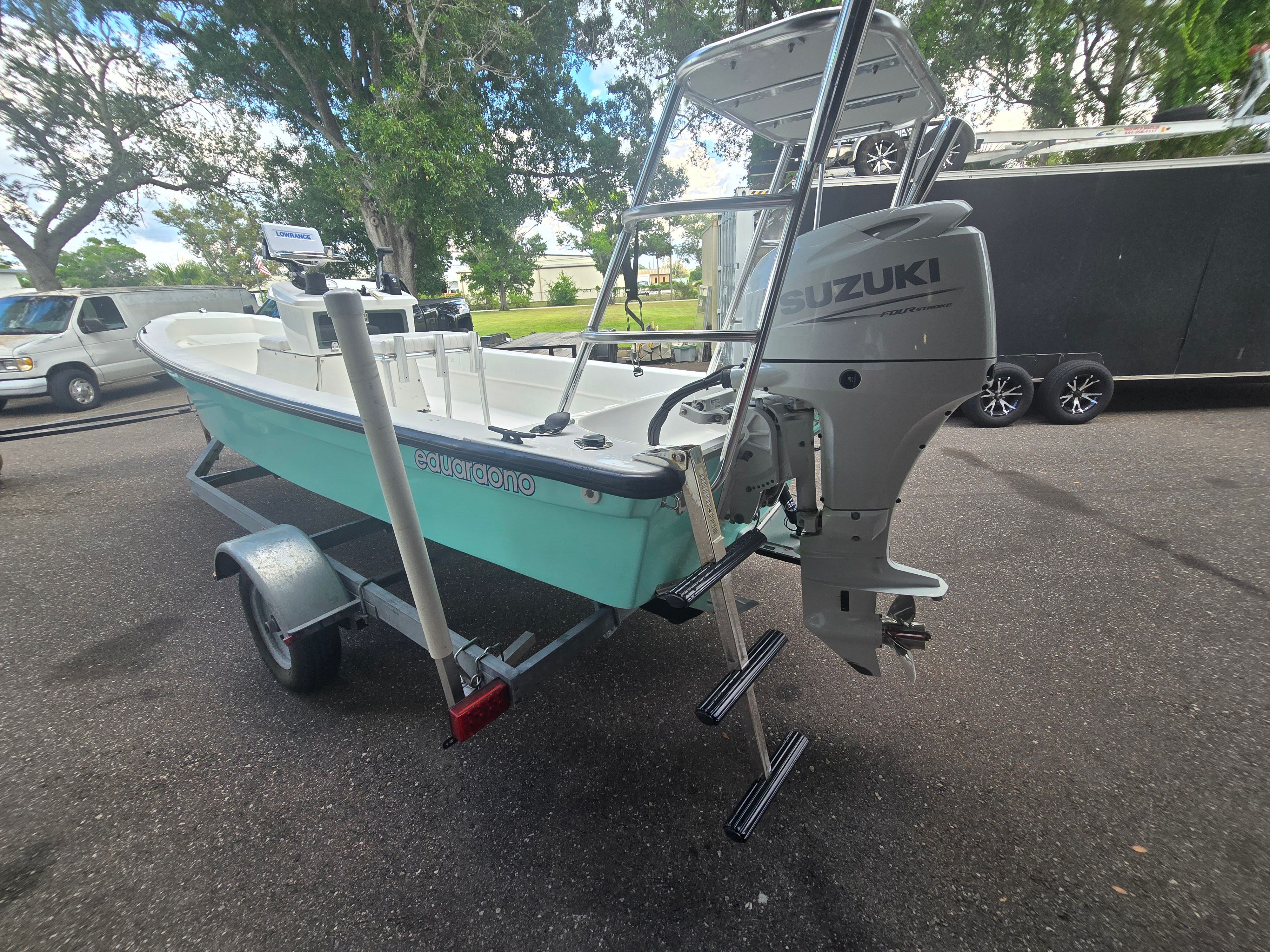 2022 Panga Eduardono boat with Suzuki outboard motor on trailer.