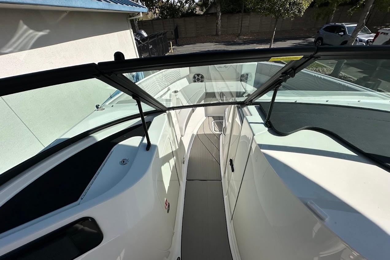 2026 Sea Ray SDX 230 Surf boat interior with sleek design and spacious seating.