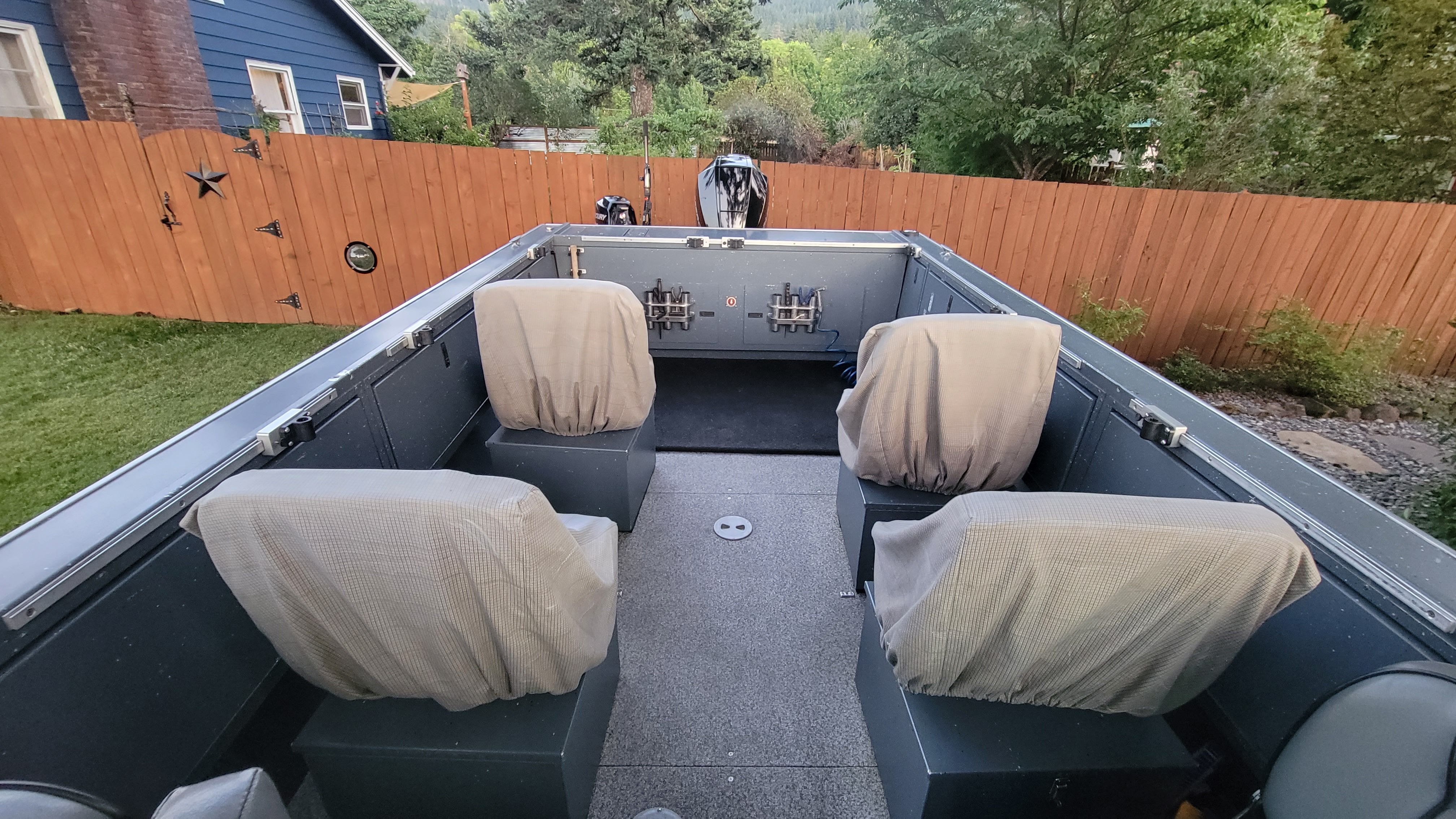 2015 Alumaweld Formula Vee Outboard 24 with four outdoor seats.