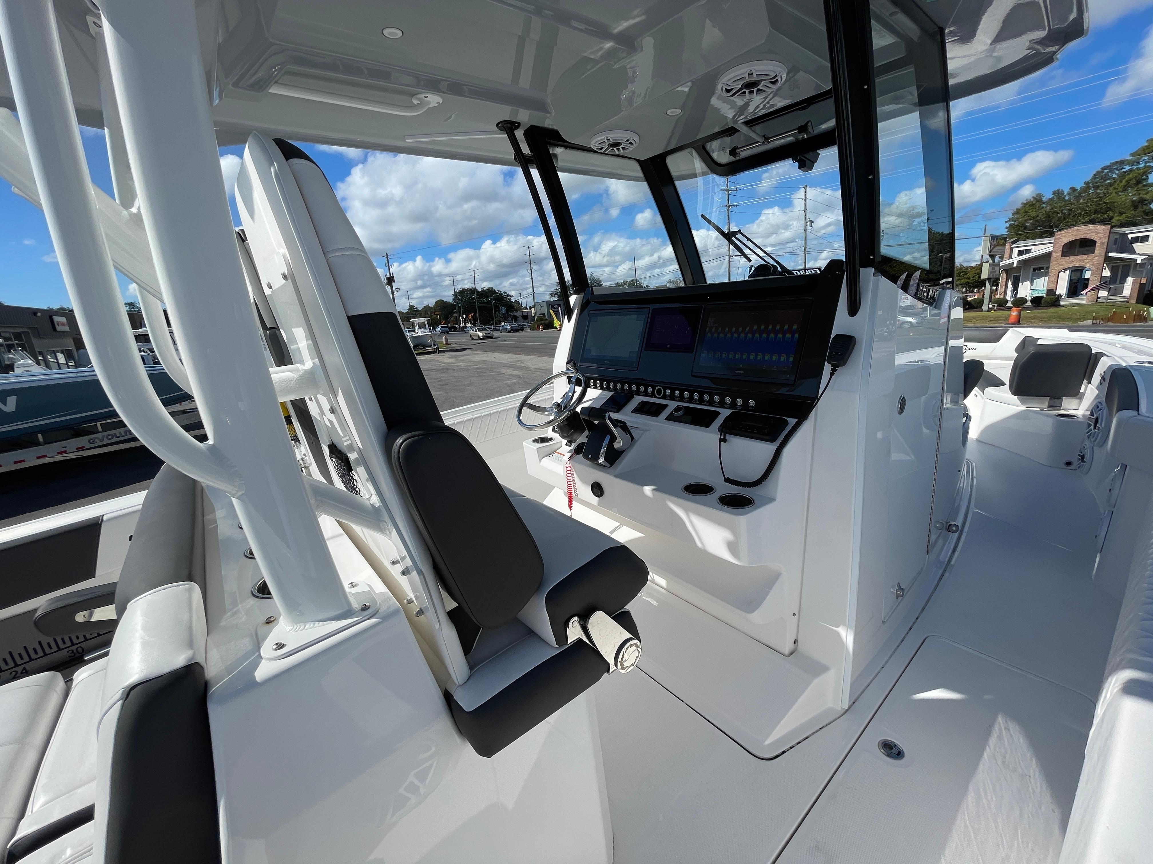 2023 Fountain 32 NX boat interior with modern dashboard and seating.