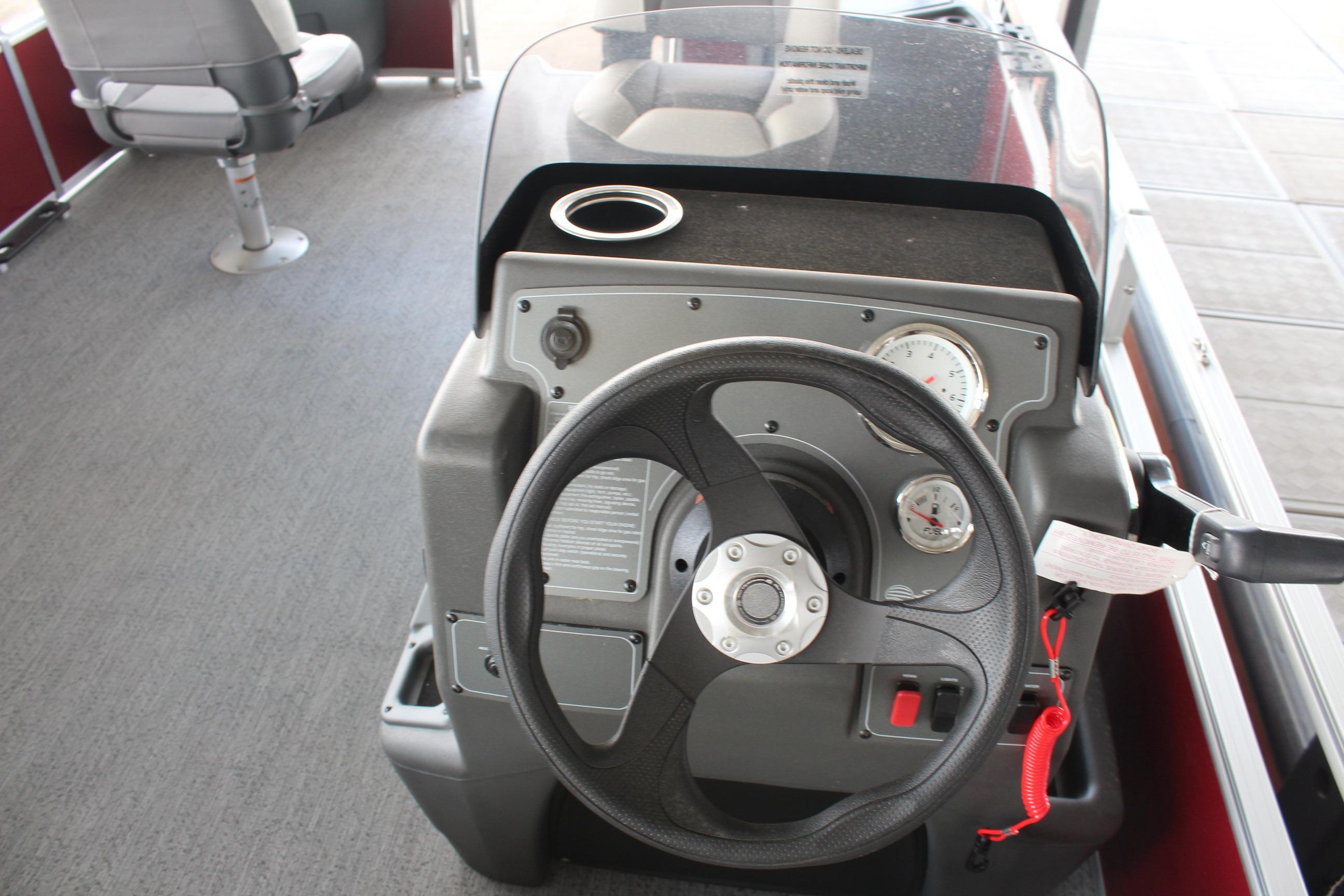 Steering console of 2026 Sun Tracker Bass Buggy 18 DLX pontoon boat.