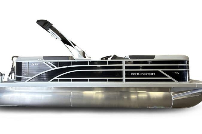 2026 Bennington 22 SSRSF pontoon boat, sleek black and silver design, side view.