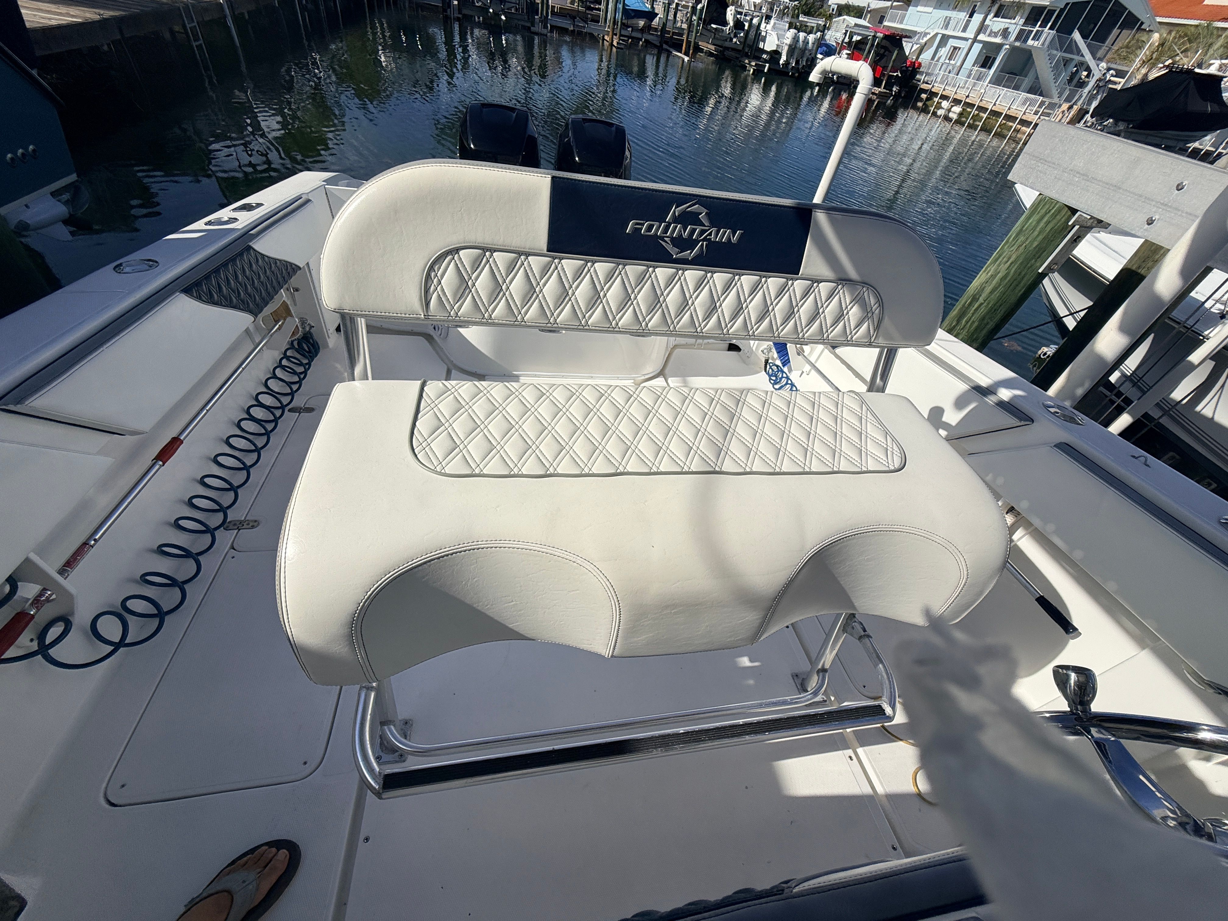 2007 Fountain 32 Center Console boat seat on deck.