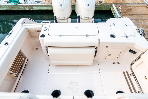 Manufacturer Provided Image: 2024 Grady-White Canyon 271 boat deck with twin outboard engines.