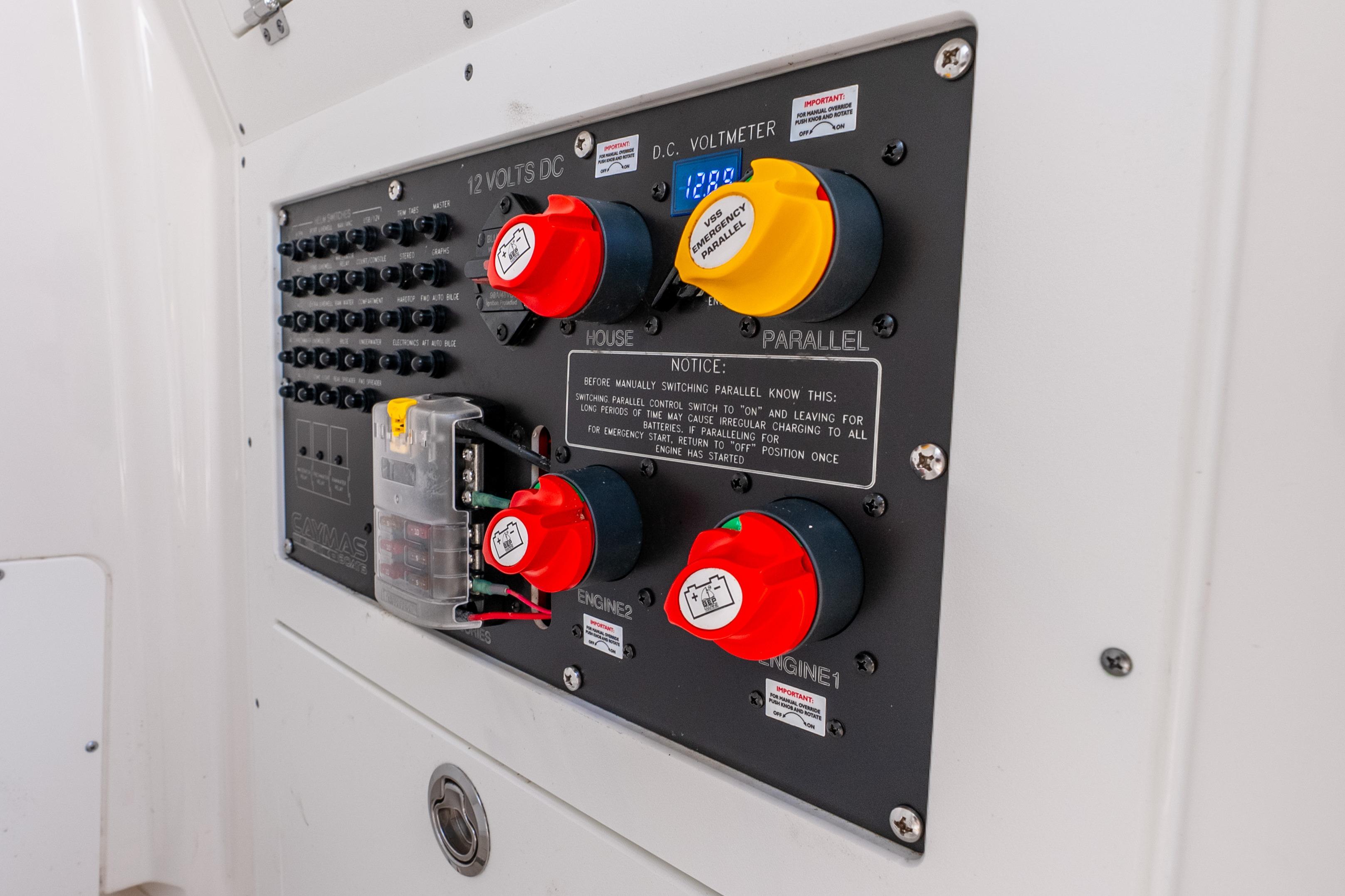 2024 Caymas 281 HB electrical panel with switches and voltmeter display.