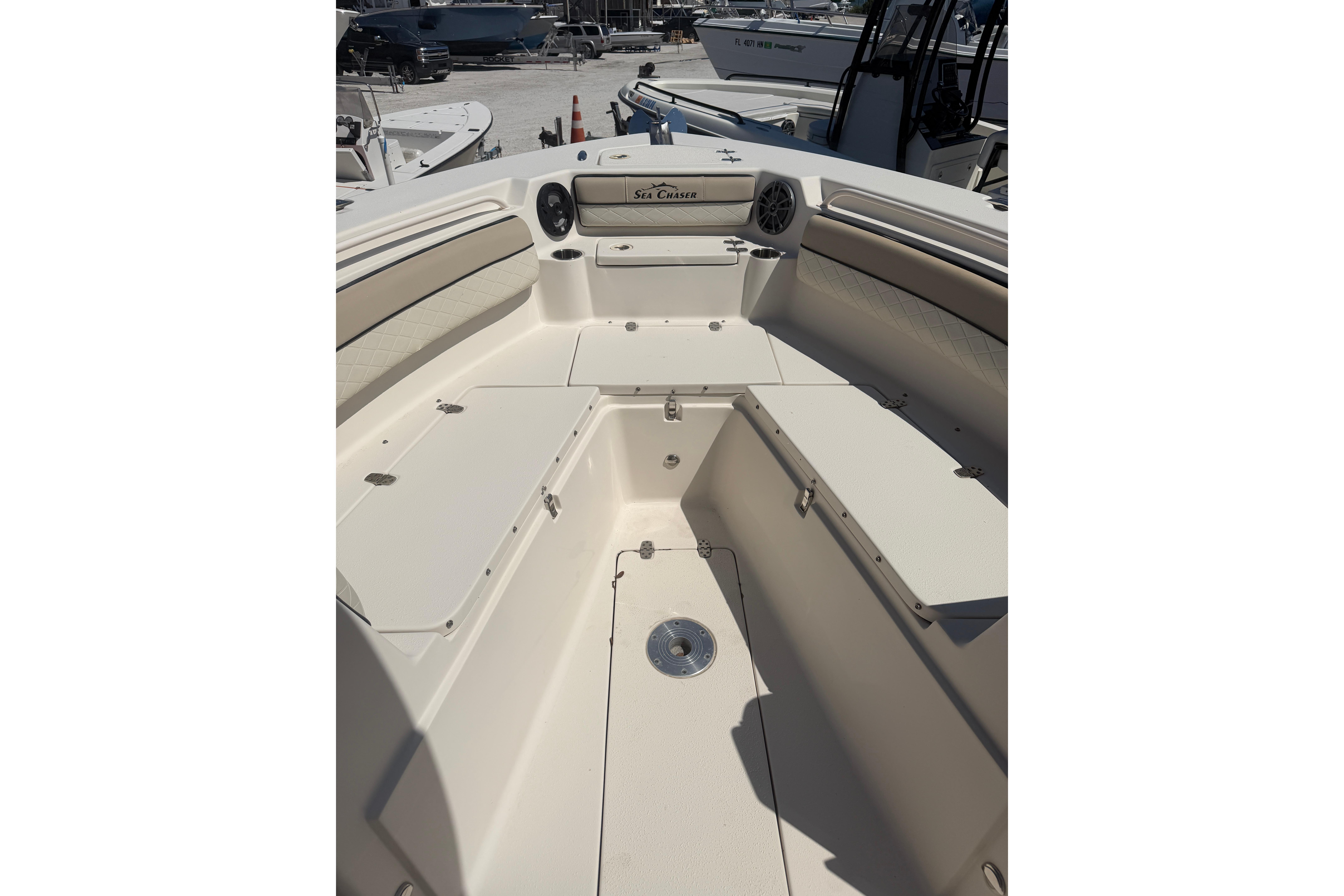 2021 Sea Chaser 30 HFC CC boat interior with seating and storage compartments.