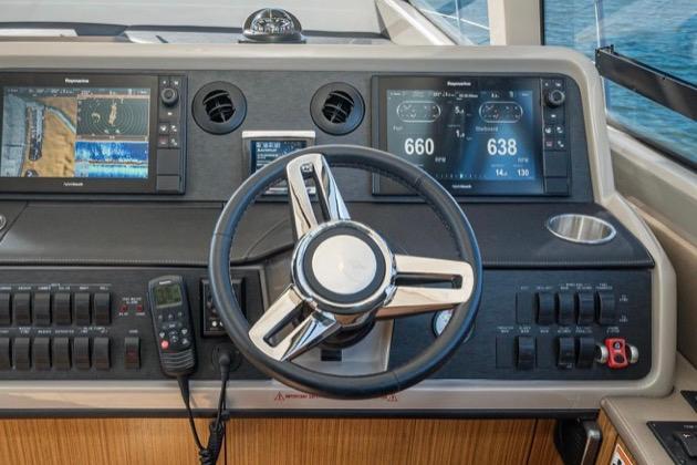 Cockpit of 2017 Sea Ray 460 Sundancer with advanced navigation displays and controls.