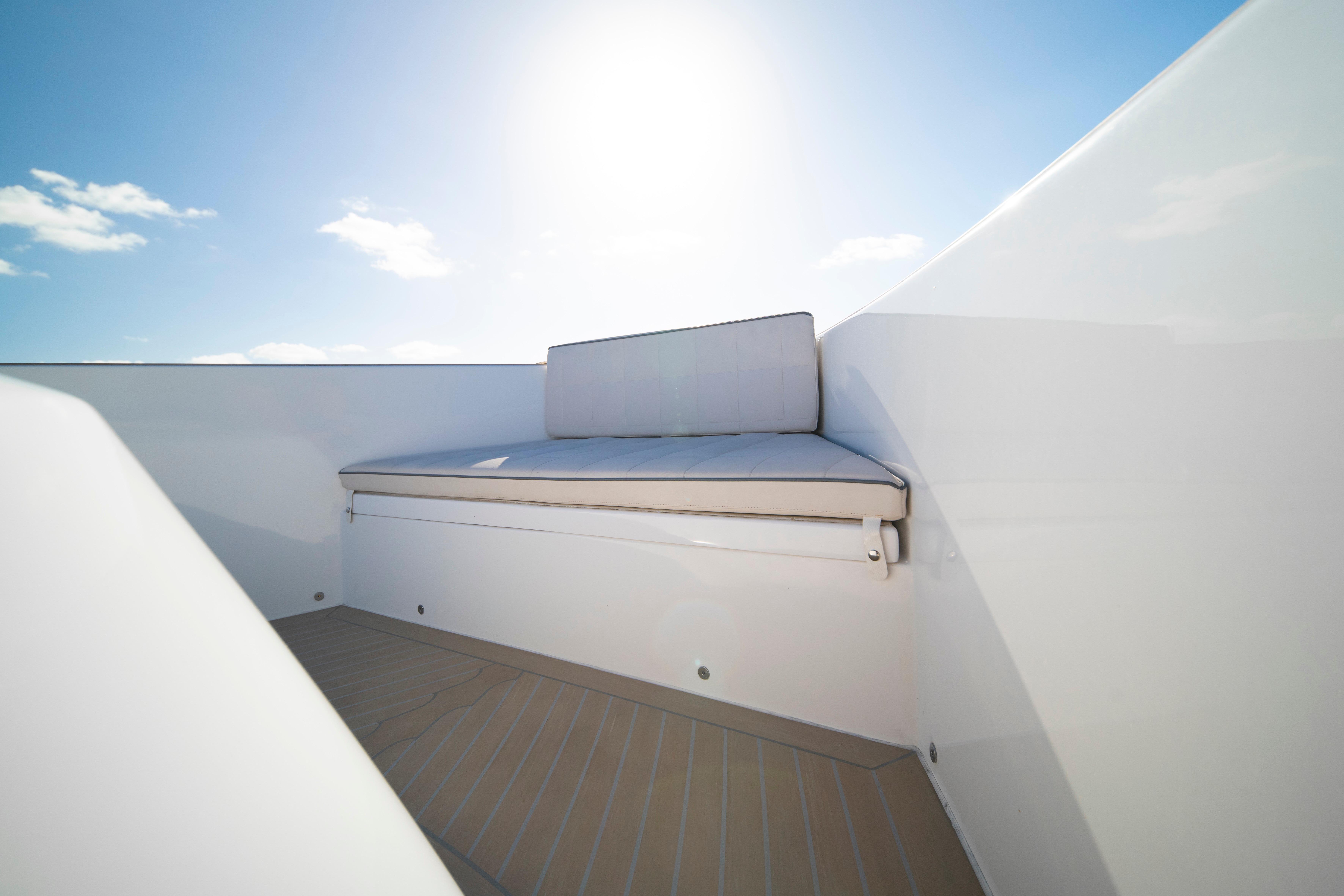 2024 Pardo Yachts P43 deck seating under clear blue sky.