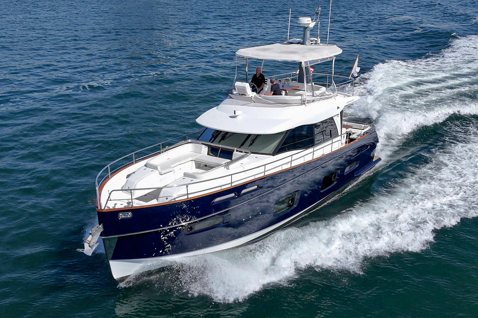 Azimut Magellano 50 yacht cruising on open water, 2013 model.