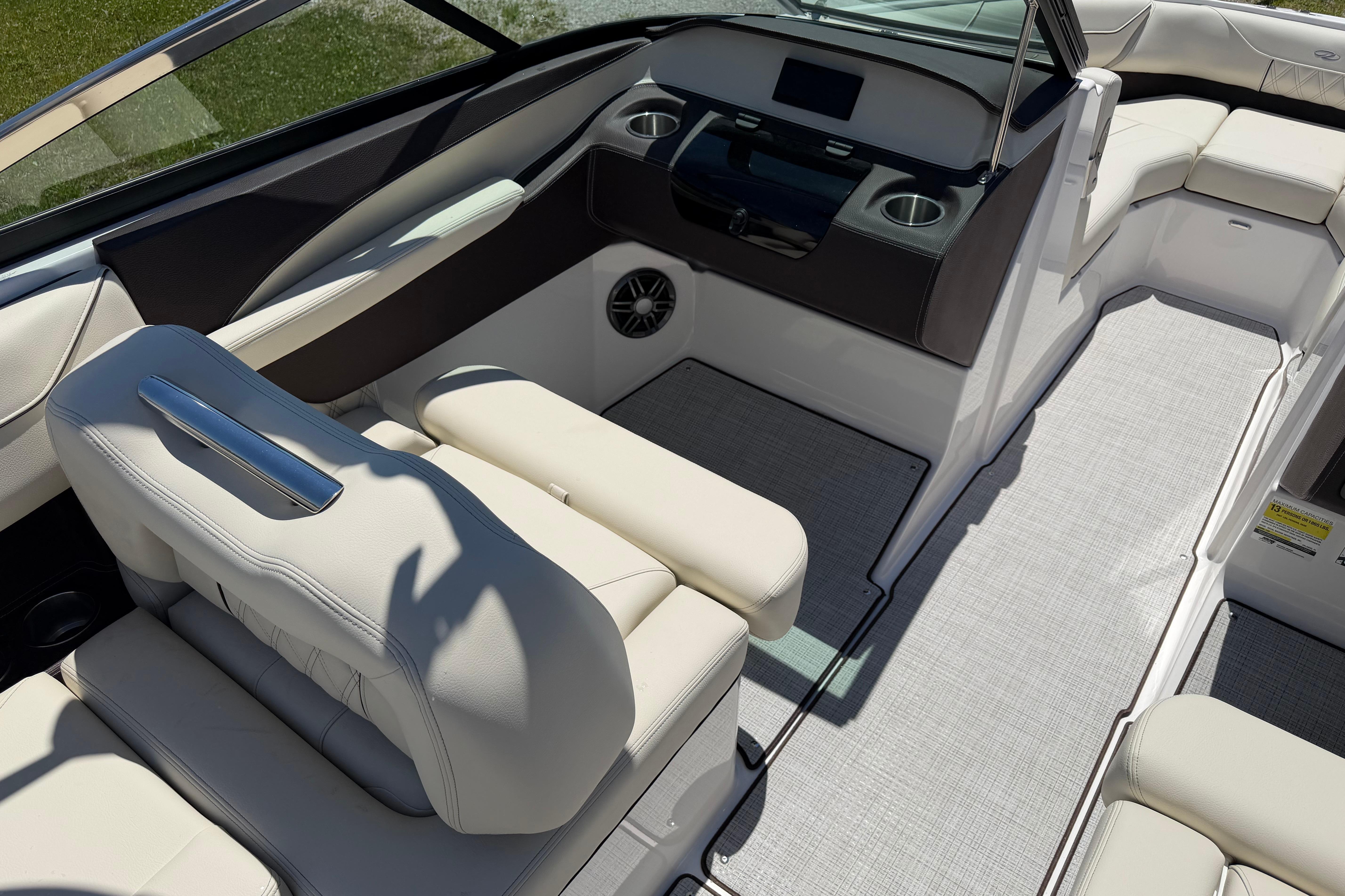 Luxurious interior of 2026 Regal LS4 boat with plush seating and modern design.