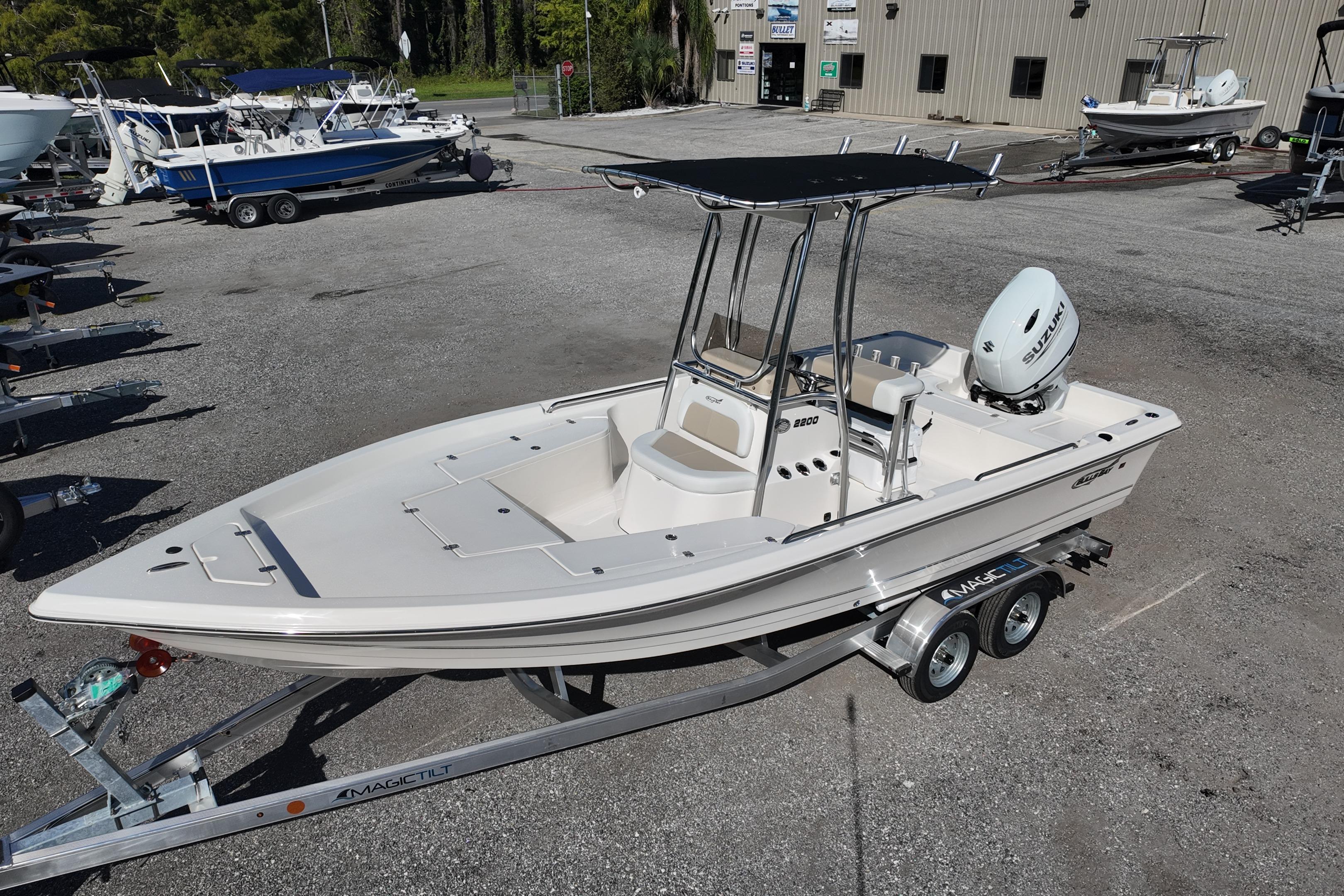 2026 Bulls Bay 2200 boat on trailer in a dealership lot, featuring a sleek design.