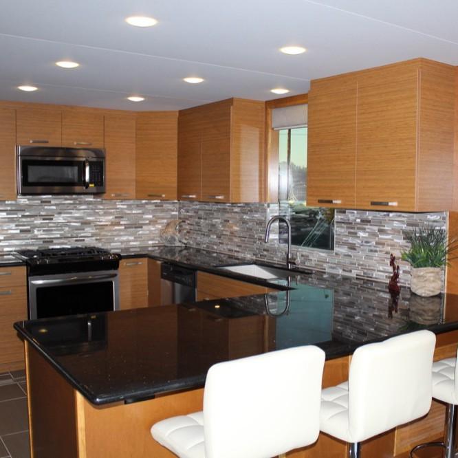 Modern kitchen with wood cabinets and granite countertop, 2015.
