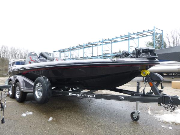2025 Ranger Z519R Cup-Equipped boat on trailer, parked outdoors.