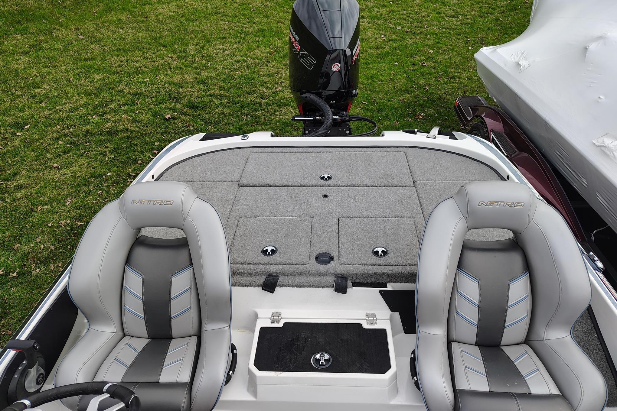 2024 Nitro Z20 boat interior with dual seats and storage compartments.