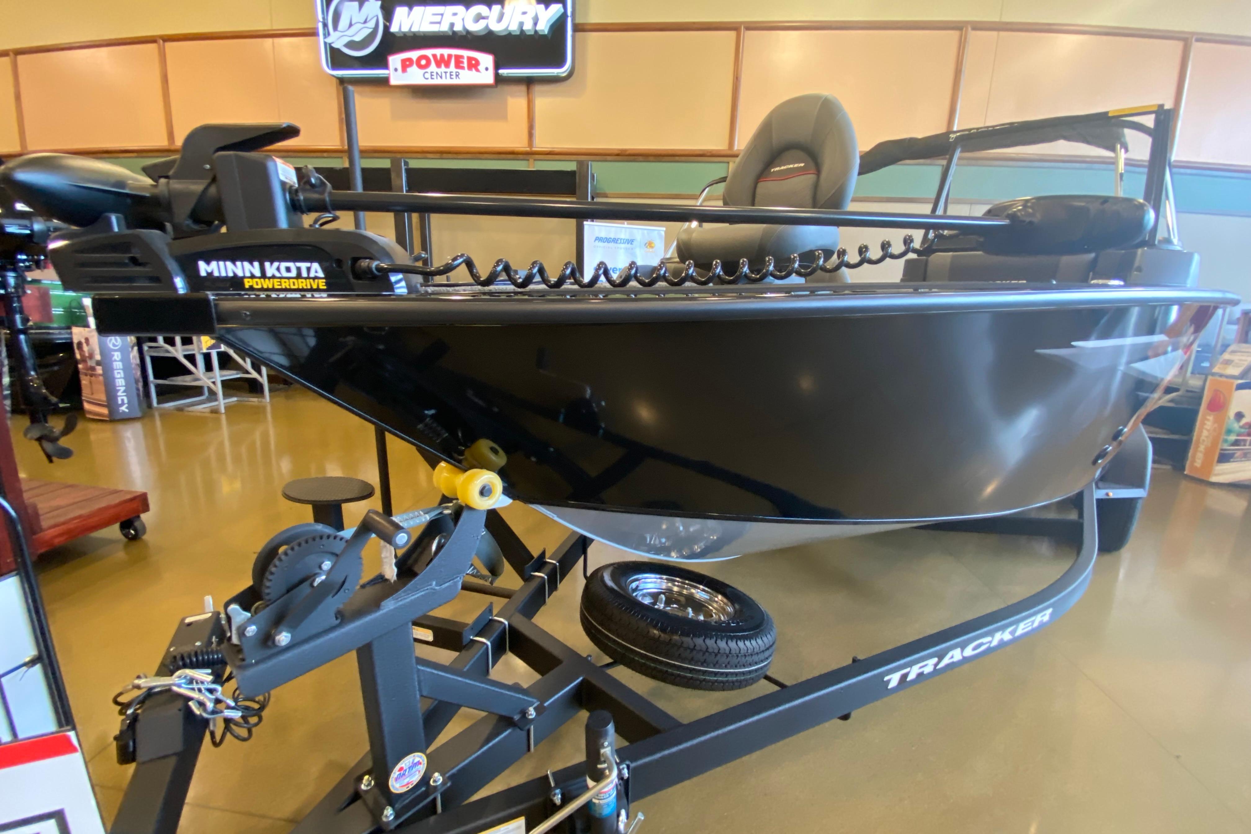 2026 Tracker Targa V-19 WT boat with Minn Kota PowerDrive, displayed indoors.