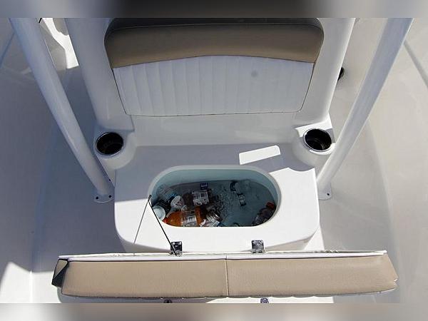 2023 Sea Born LX22 Center Console boat with built-in cooler and cup holders.