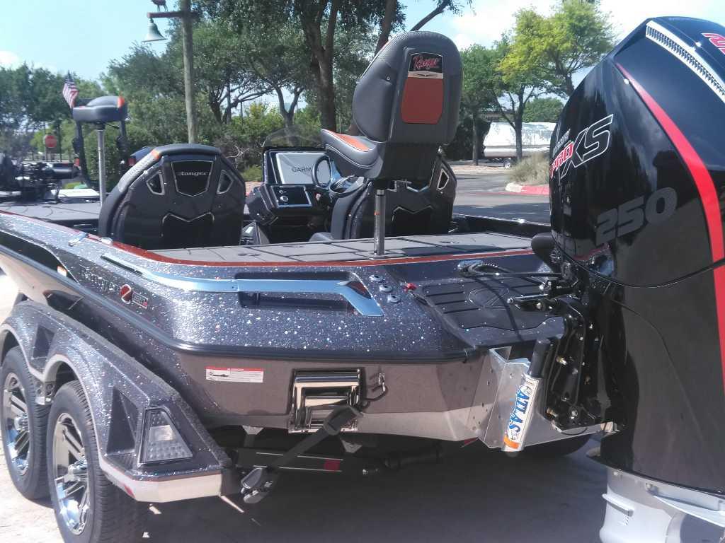 2025 Ranger Z520R Cup-Equipped boat with powerful engine, parked outdoors.