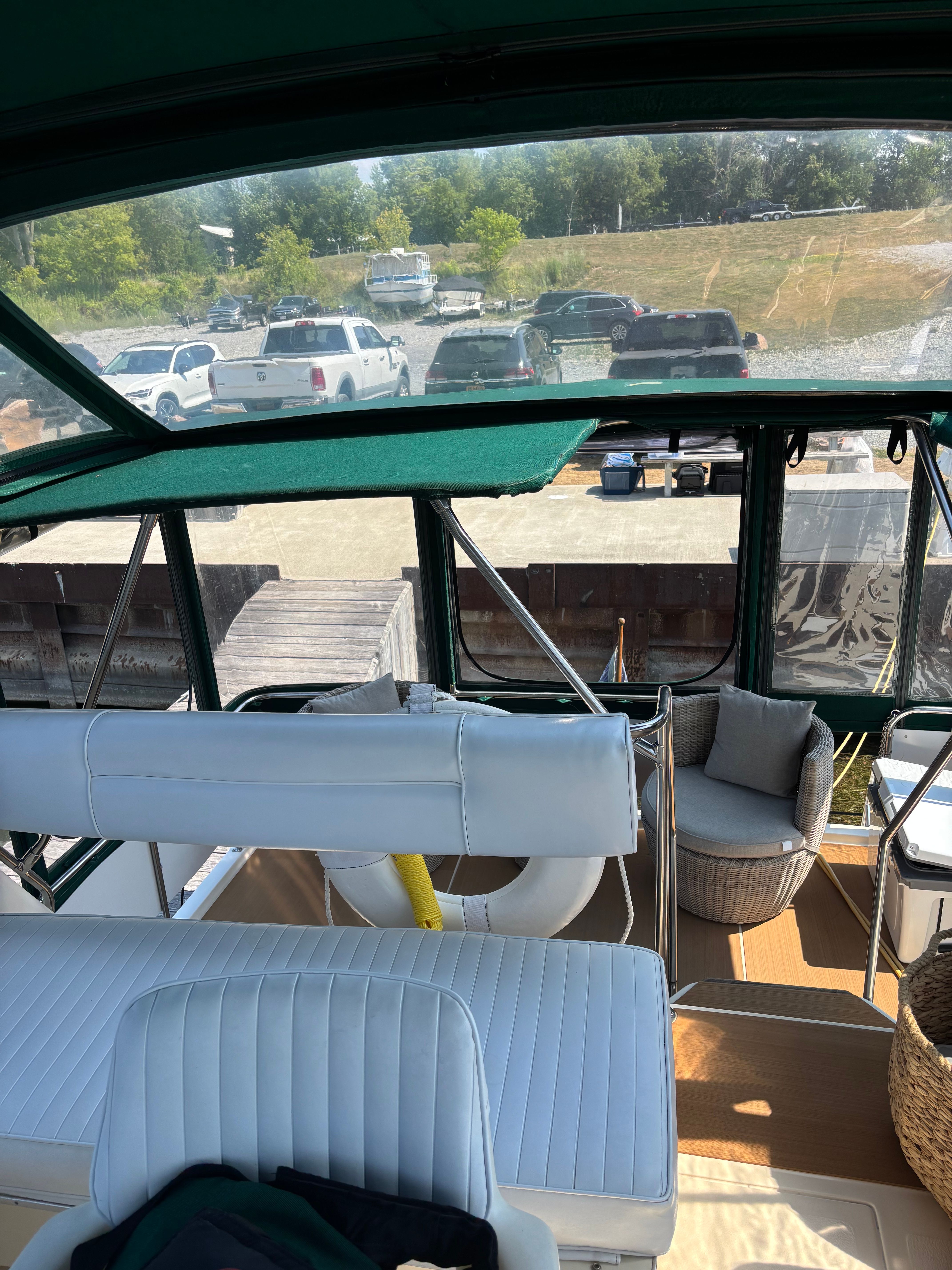 Interior of a 1986 Sea Ray 360 Aft Cabin yacht with white seating.
