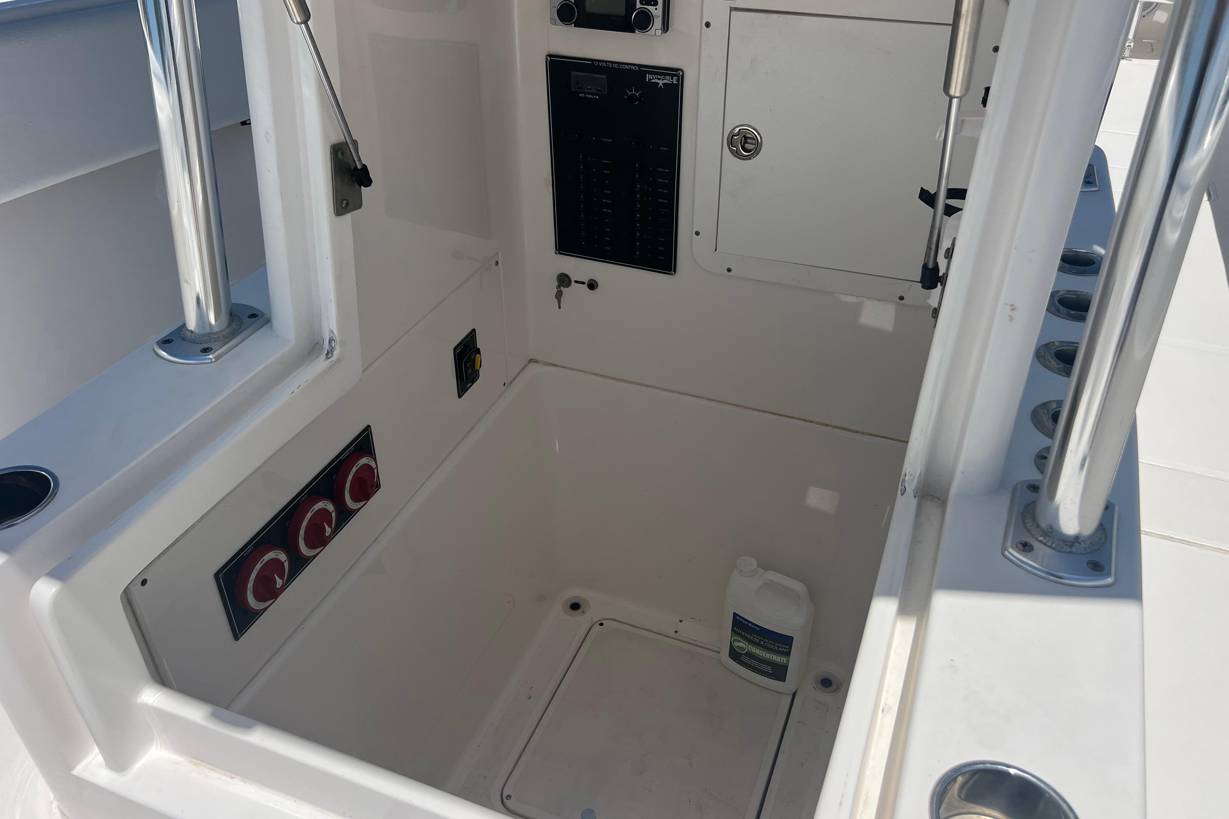 Interior view of 2012 Invincible 33 Open Fisherman boat console area.