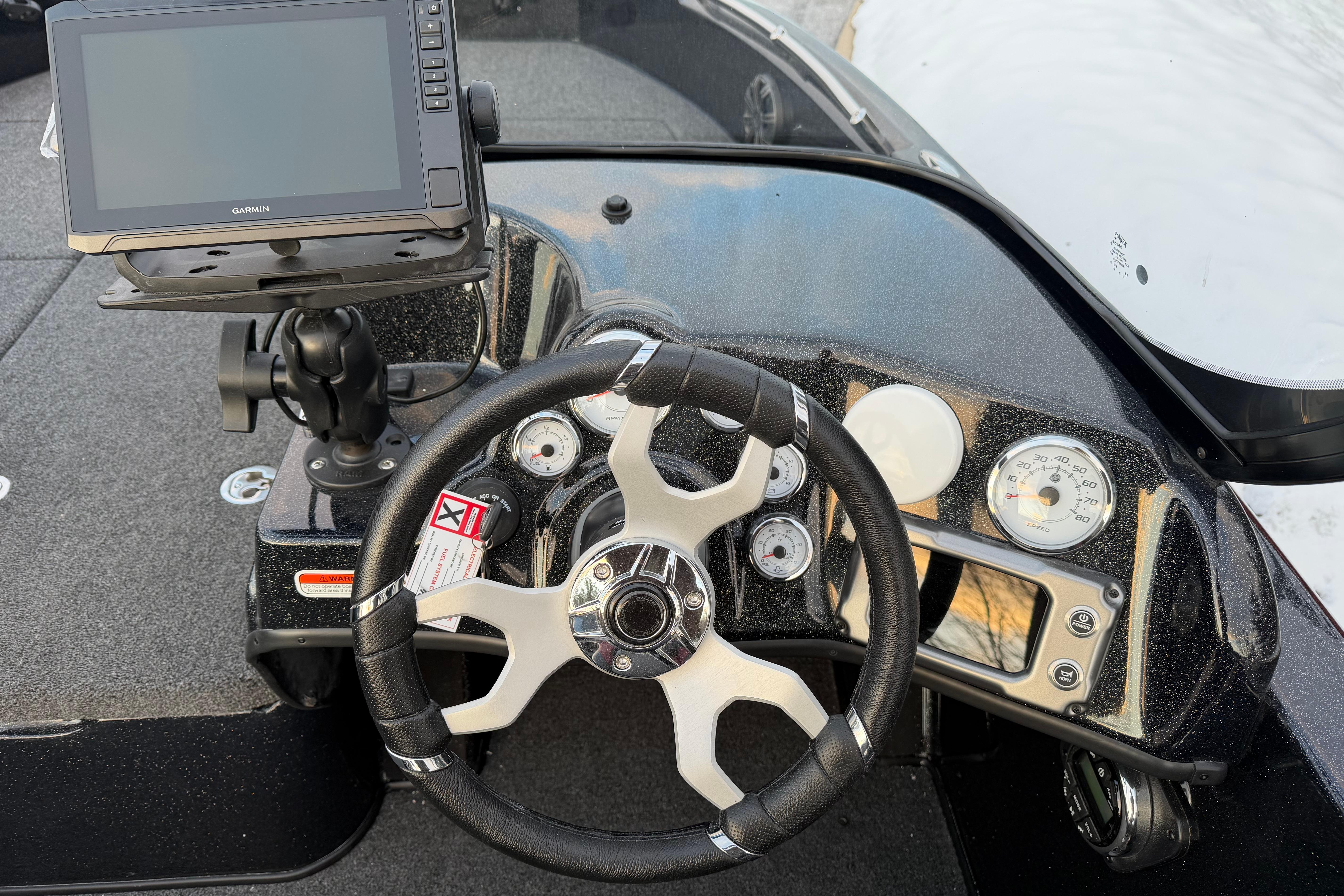 2026 Nitro ZV19 Sport Pro dashboard with steering wheel and navigation display.