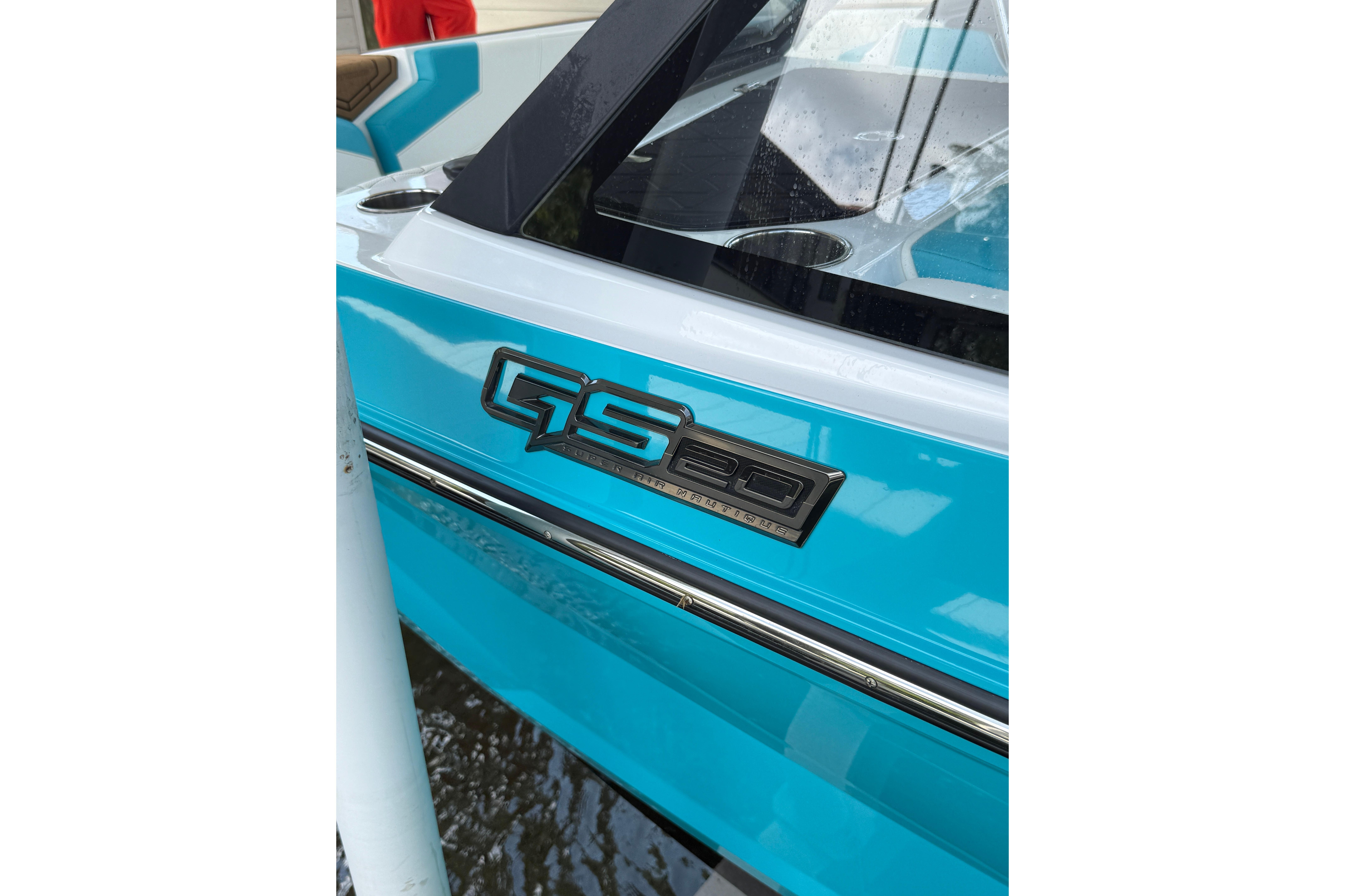 2024 Nautique Super Air Nautique GS20 boat, blue exterior with GS20 emblem.