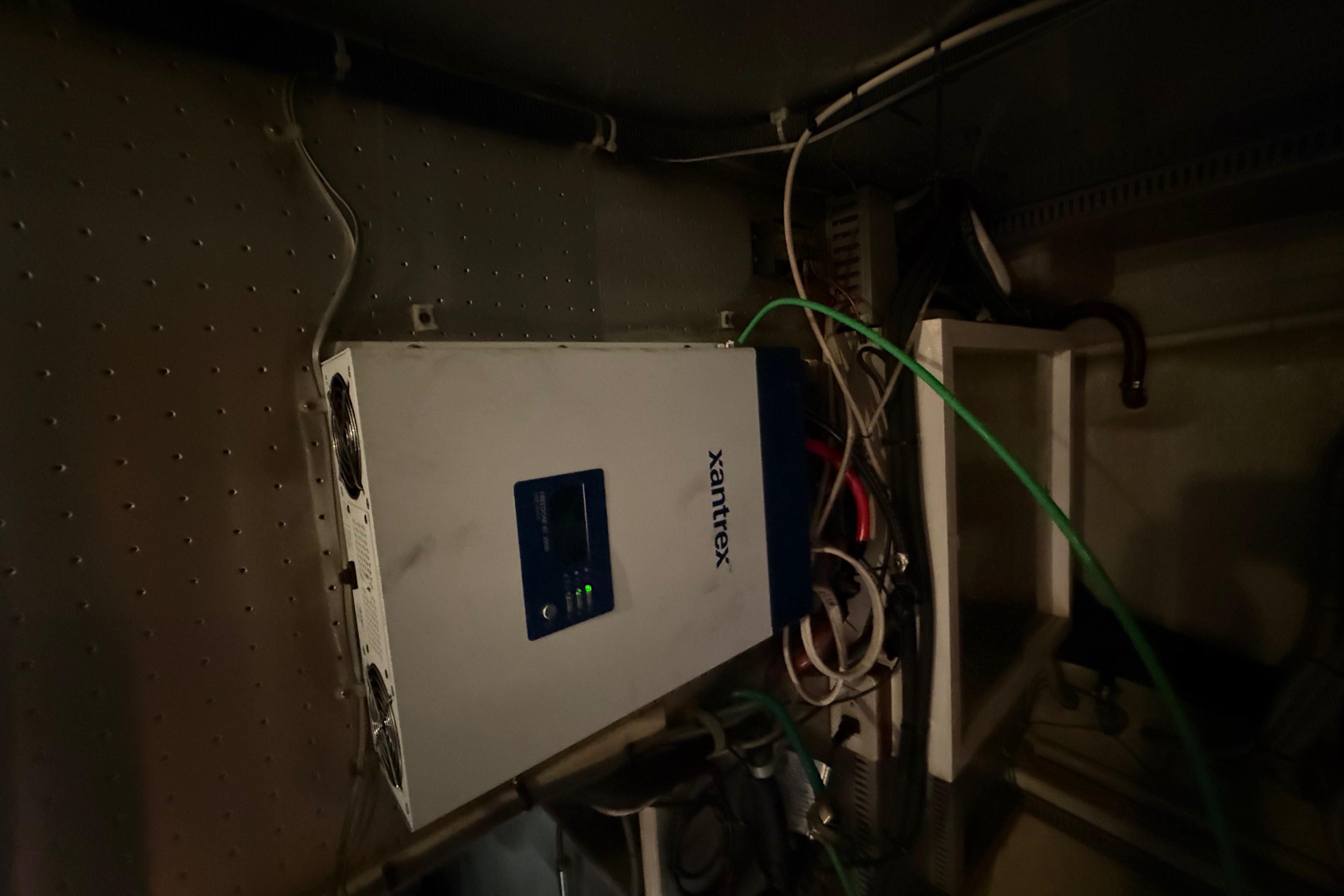 Electrical system inside a 2001 Kadey-Krogen 39 boat, featuring a Xantrex inverter.
