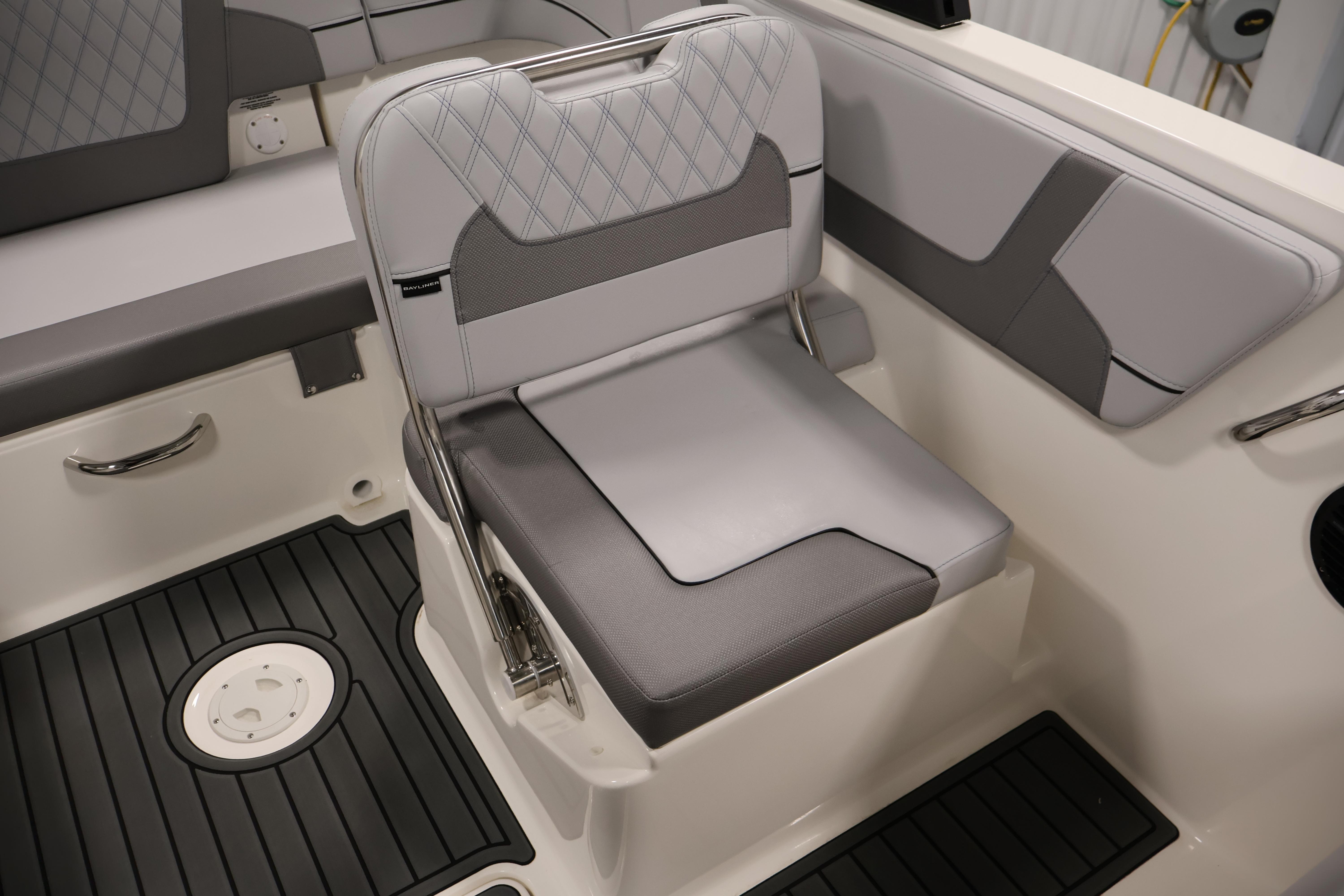 2026 Bayliner VR6 Bowrider I/O interior with gray seating and sleek design.