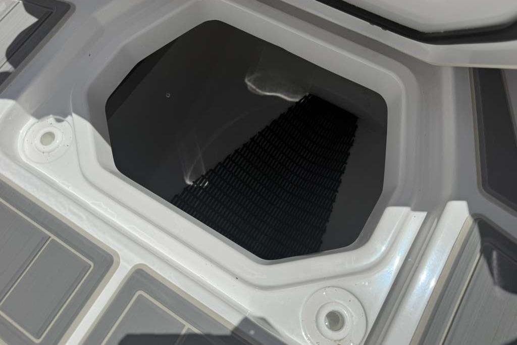 Storage compartment of 2026 Monterey Elite 30 OB boat, featuring sleek design and durable materials.