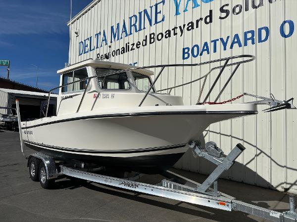 2023 Defiance Admiral 220 EX boat on trailer at Delta Marine Yacht Center.