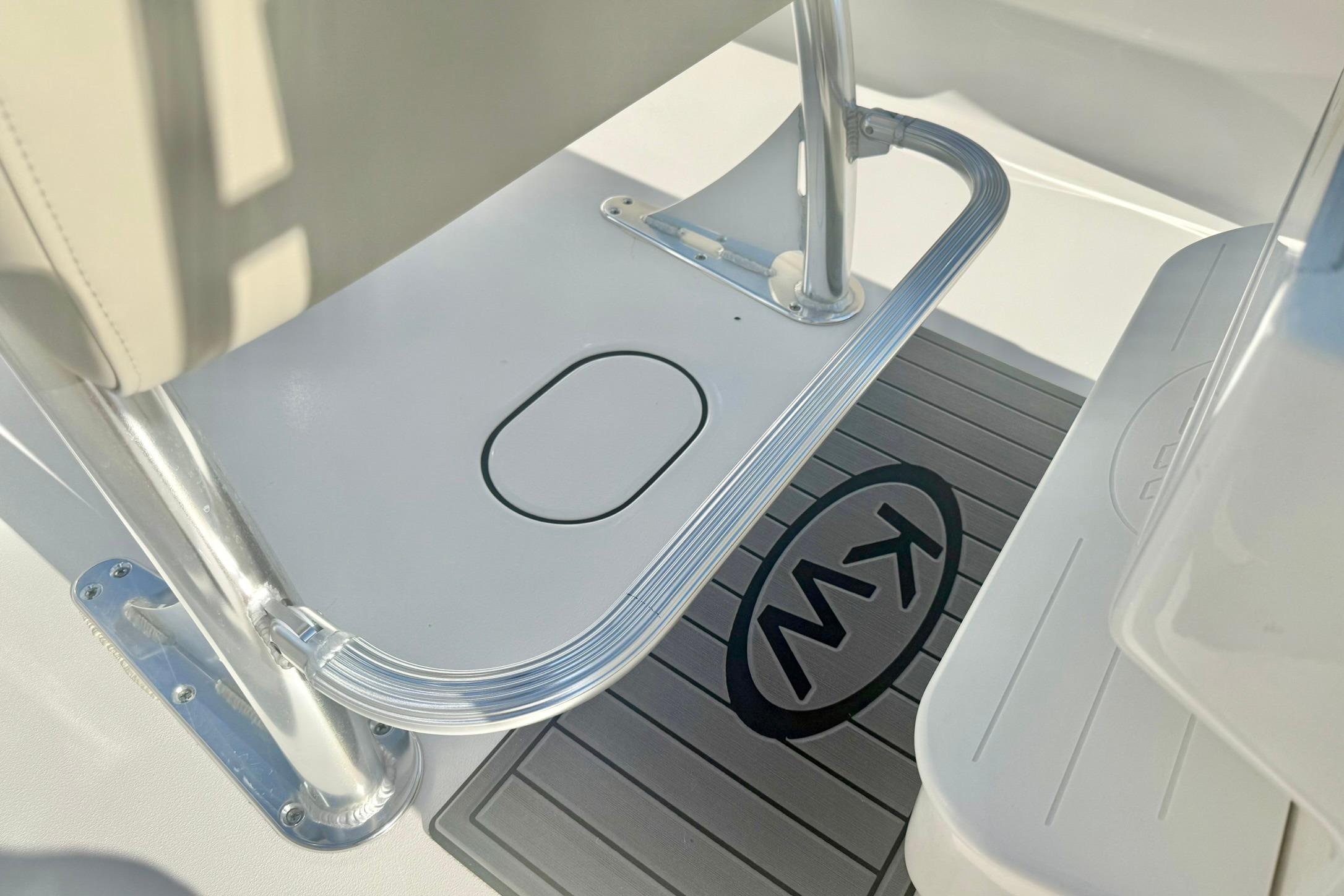 2026 Key West 189 FS boat interior with KW logo on floor mat.
