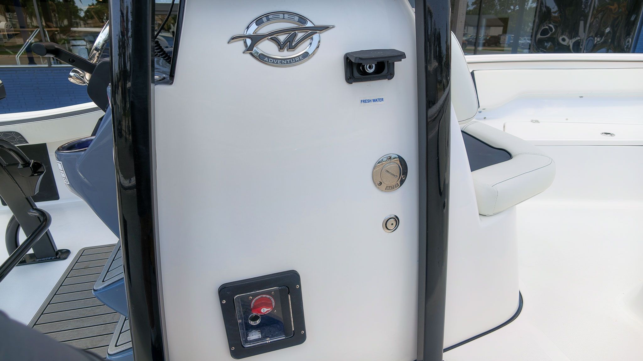 Close-up of the helm area on a Tidewater 198 CC Adventure boat.