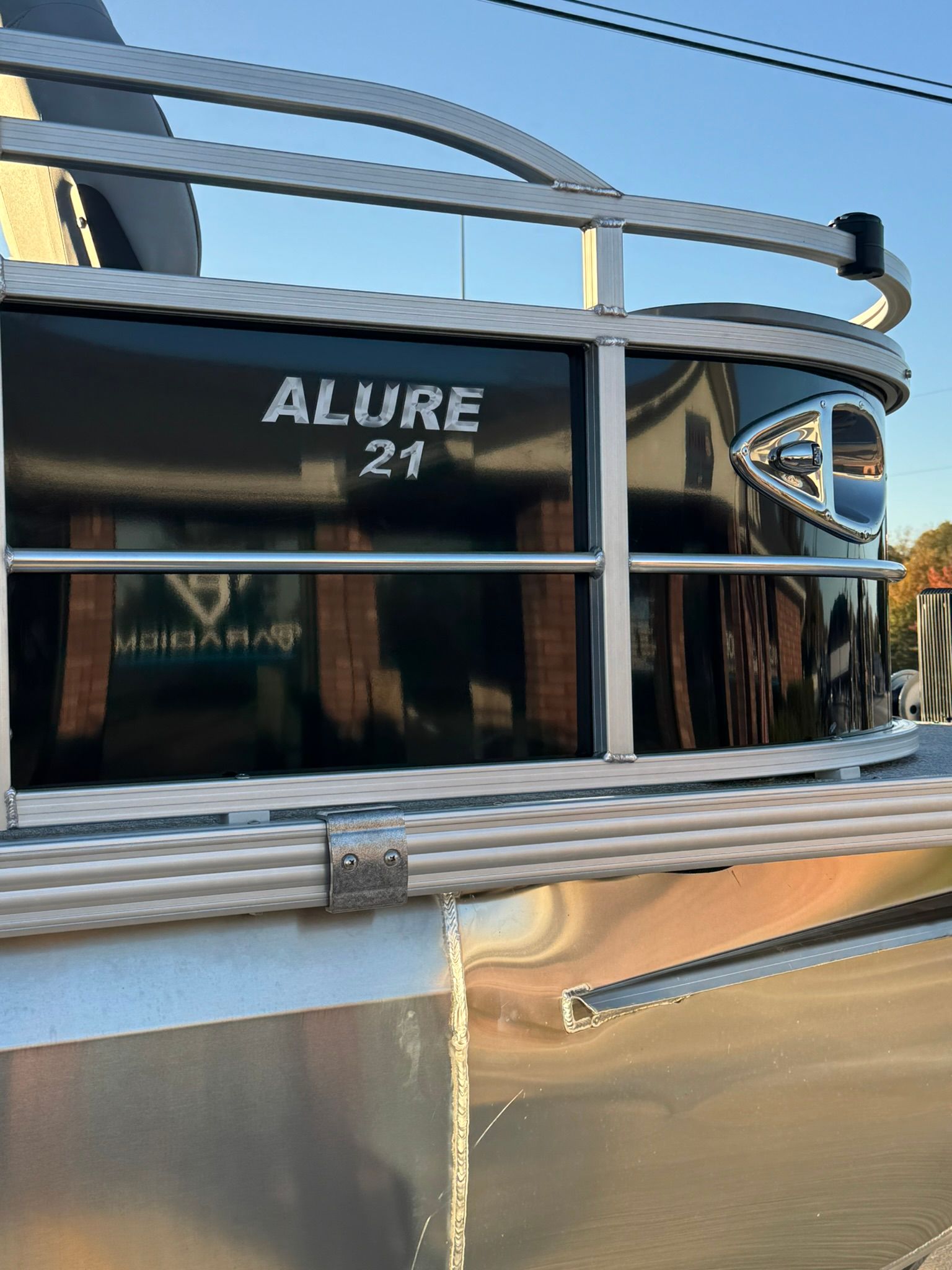 Landau Alure 21CC Fish 2026 boat, close-up of nameplate.