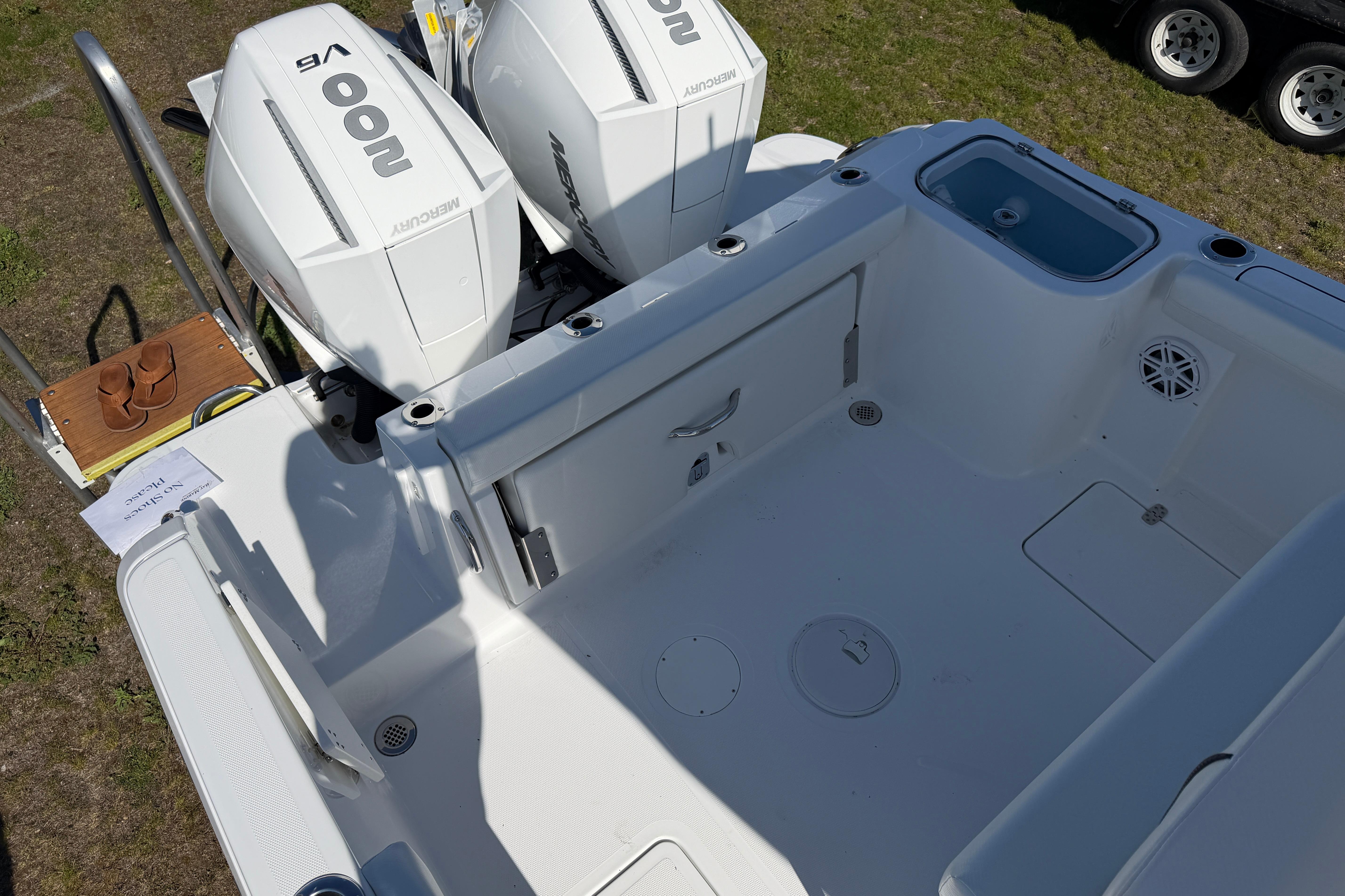 Wellcraft 243 Fisherman 2026 with Mercury engines, spacious deck.